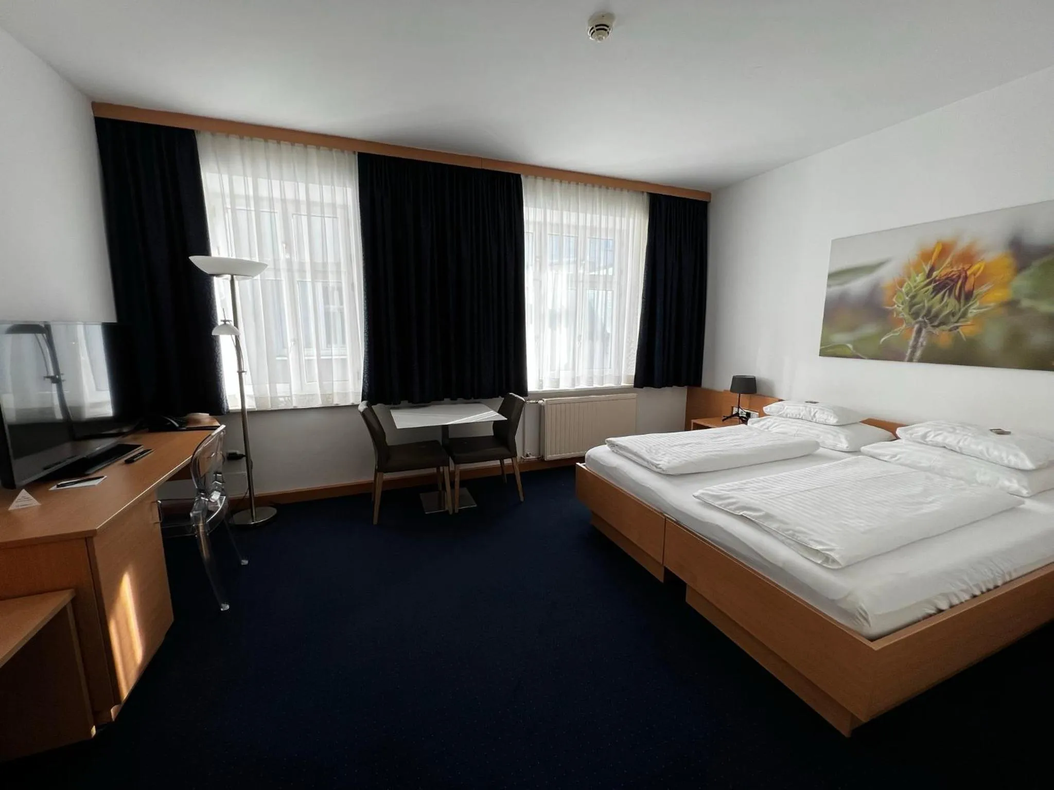 TV and multimedia, Bed in H+ Hotel Ried