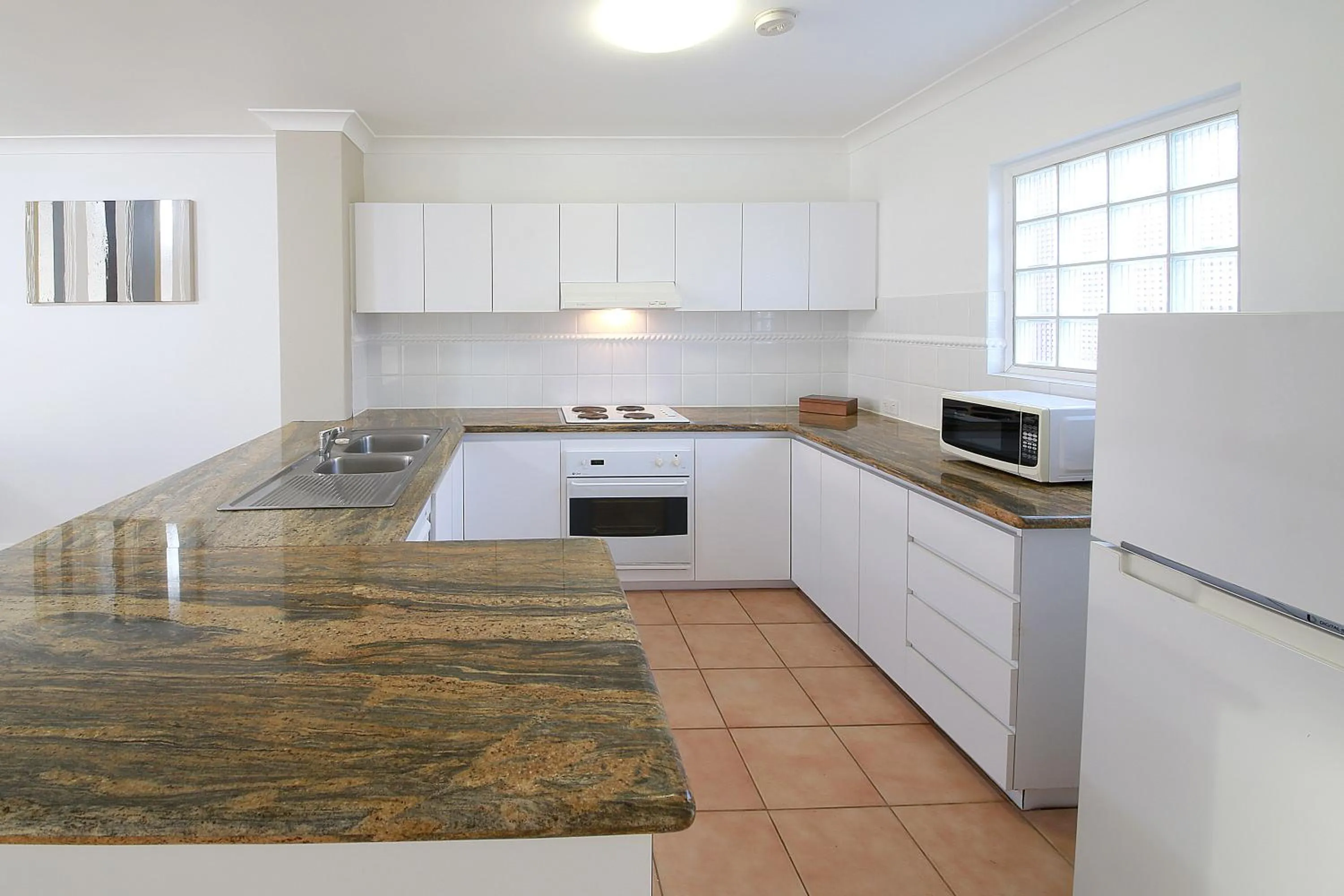 Kitchen or kitchenette in Nautica Residences Hillarys