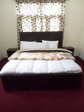 Bed in Hunza Regency Inn