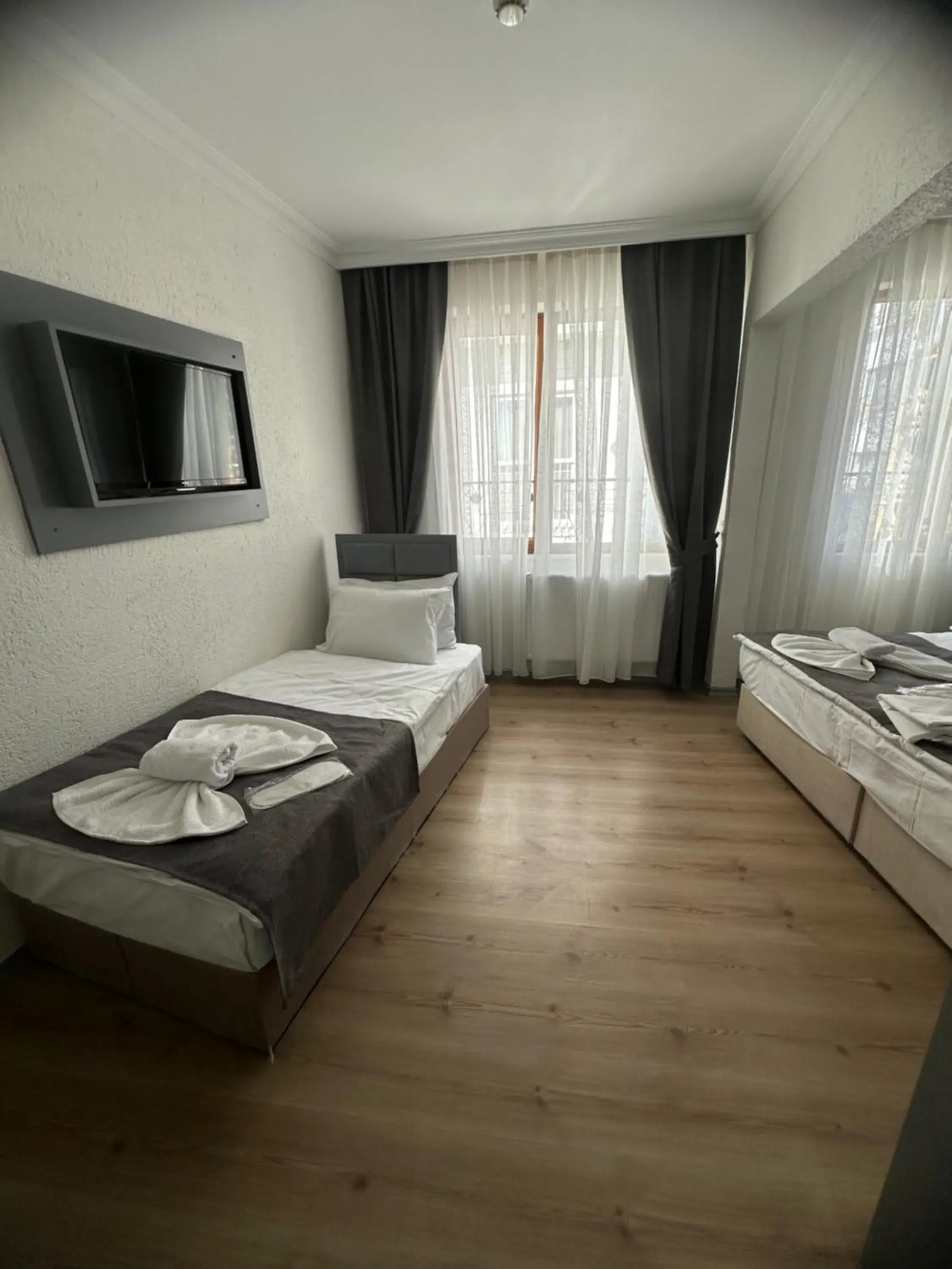 Deluxe Triple Room in Big Orange Hotel Old City Deluxe Triple Room in Big Orange Hotel Old City