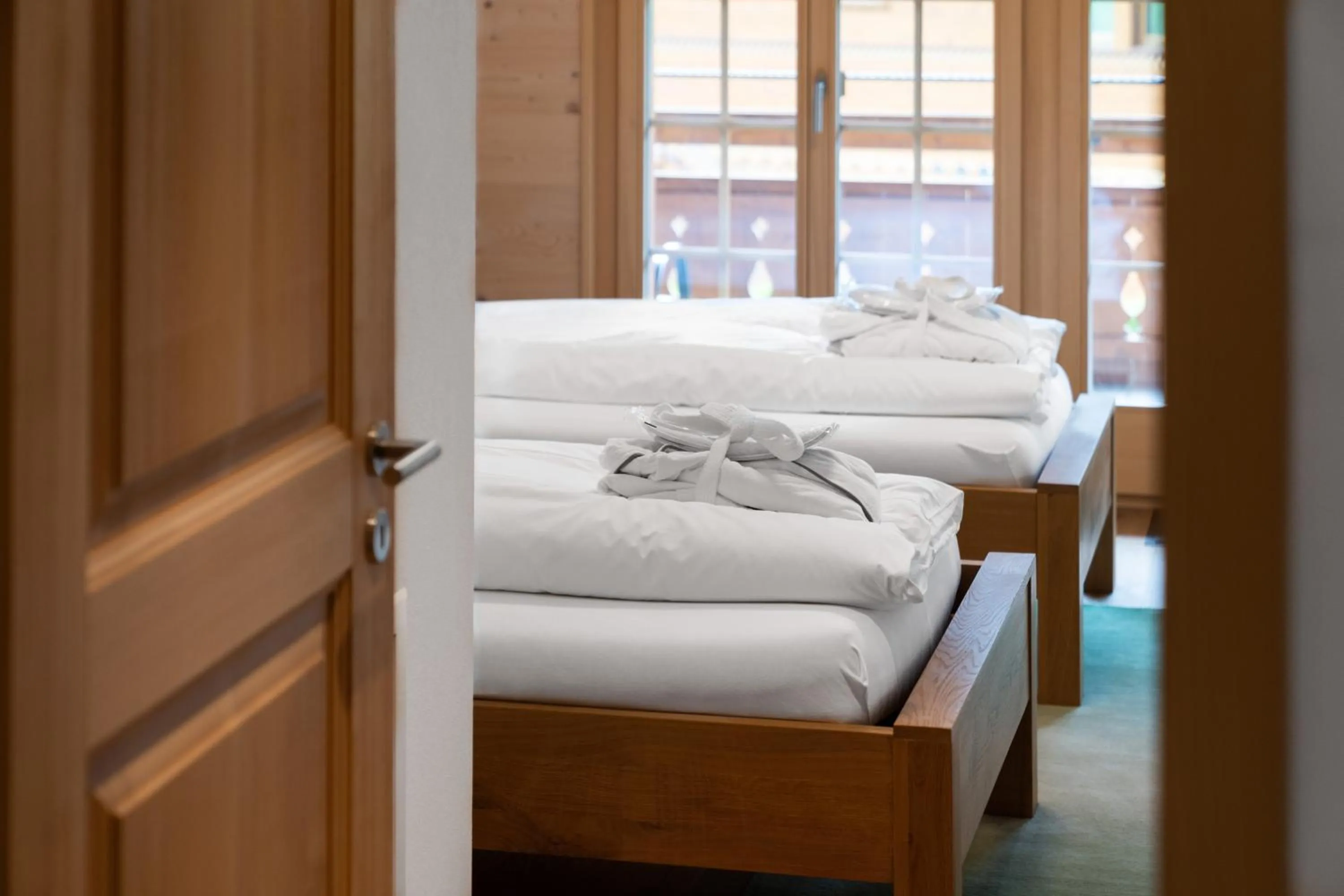 Bedroom, Bed in Chalet Alia and Apartments-Grindelwald by Swiss Hotel Apartments