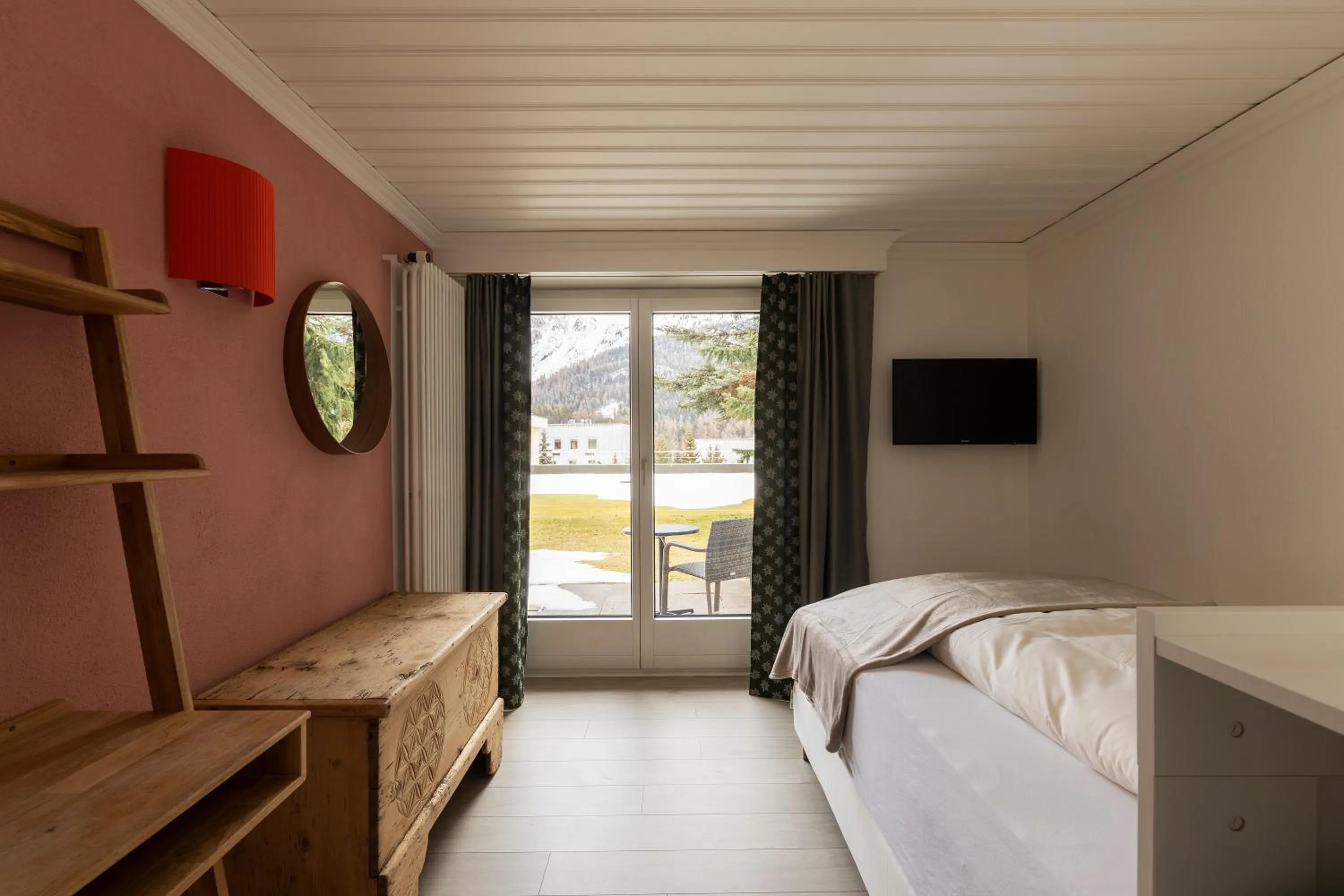 Bed in Hotel Europa Suites St Moritz