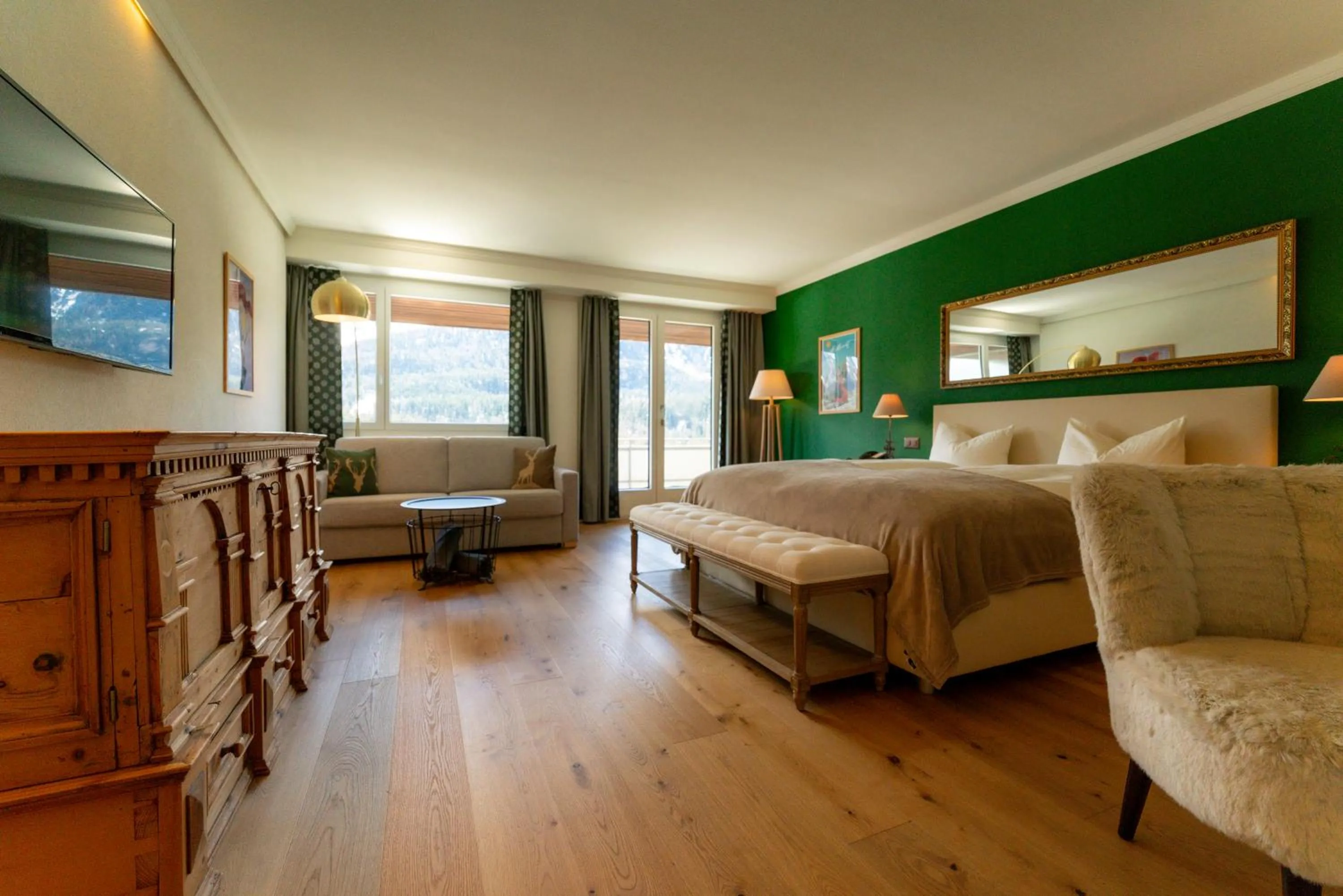 Bed in Hotel Europa Suites St Moritz