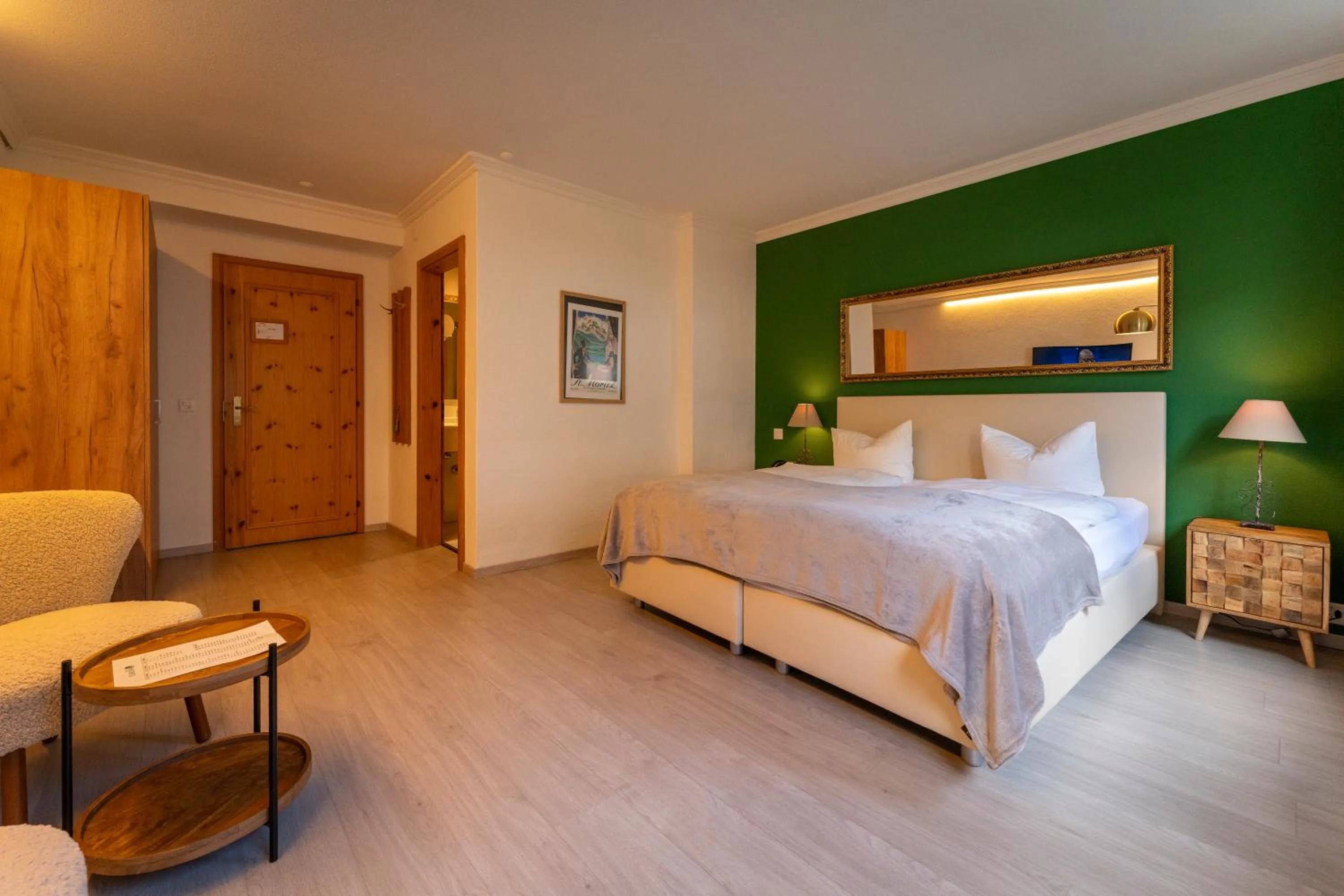 Bed in Hotel Europa Suites St Moritz