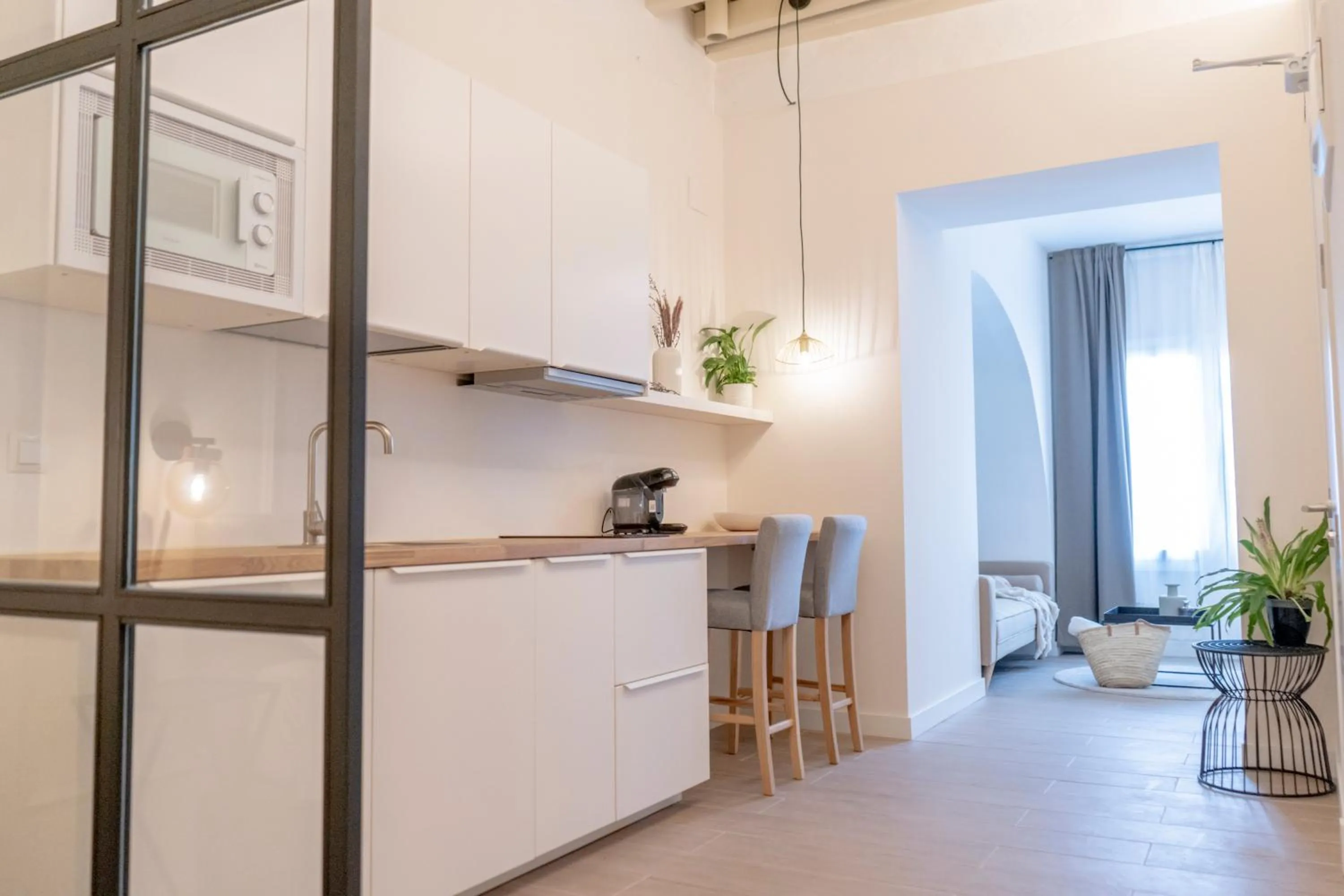 Kitchen or kitchenette in Suites Alfonso X