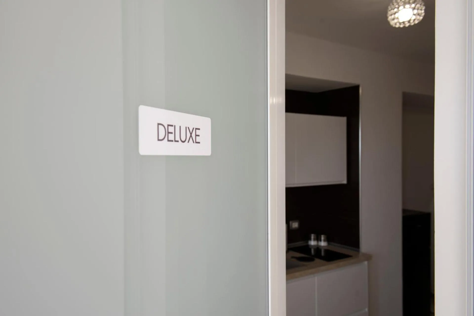 Logo/Certificate/Sign in MADAGÌ Beachfront Apartments
