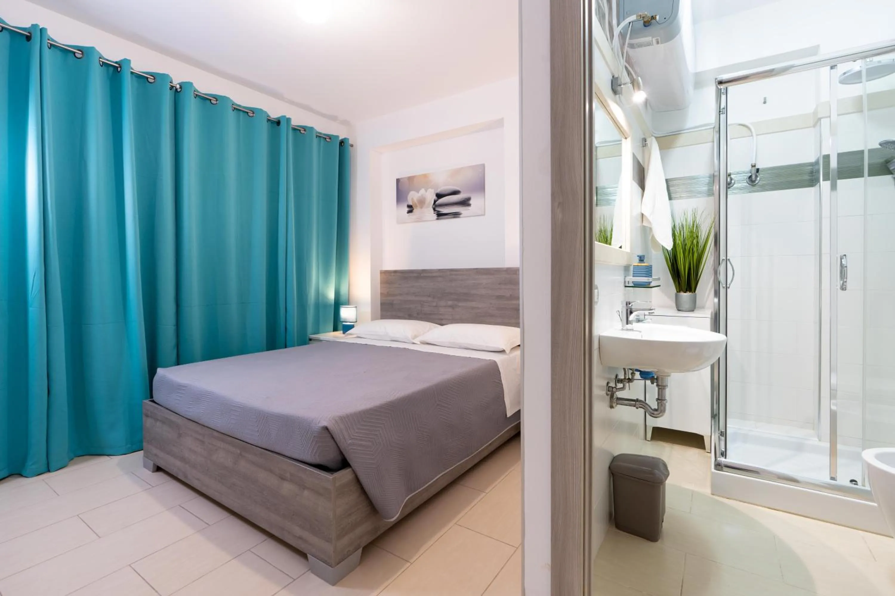 Bed in MADAGÌ Beachfront Apartments