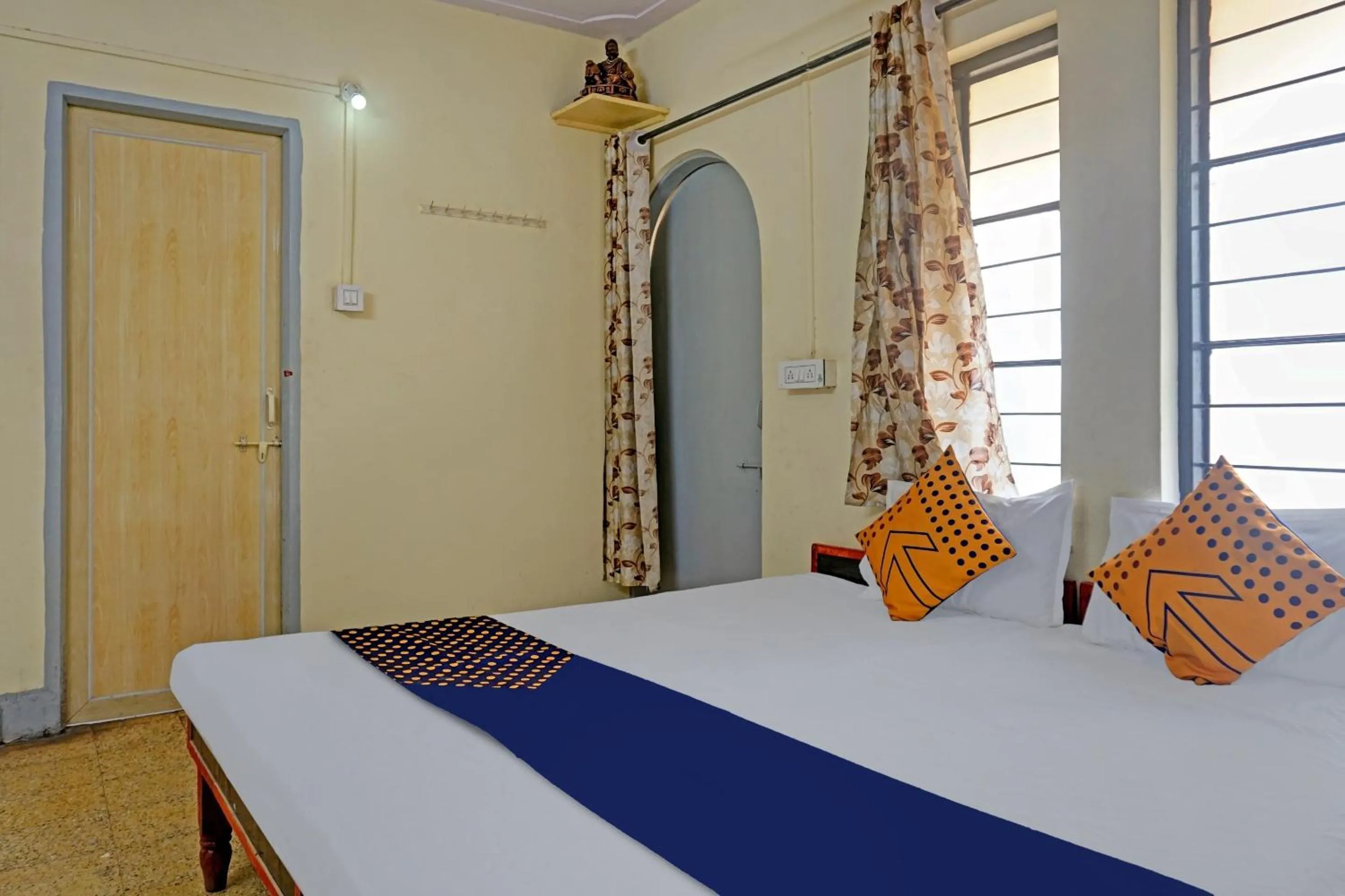 Bedroom, Bed in SPOT ON Hotel Prakash Residency, Near Hanuman Gym Ajmera Colony, Pimpri