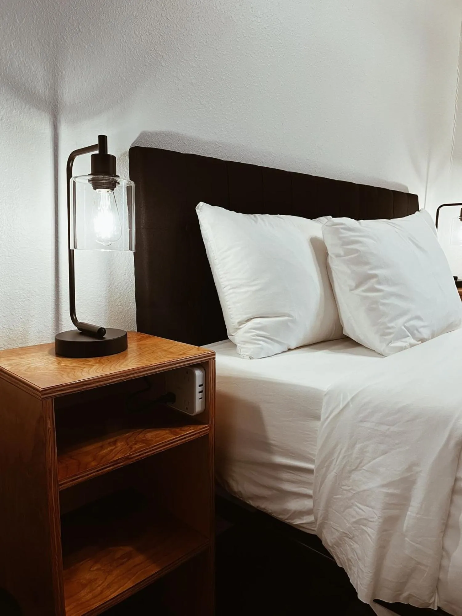 Bed in Jackalope Motor Lodge