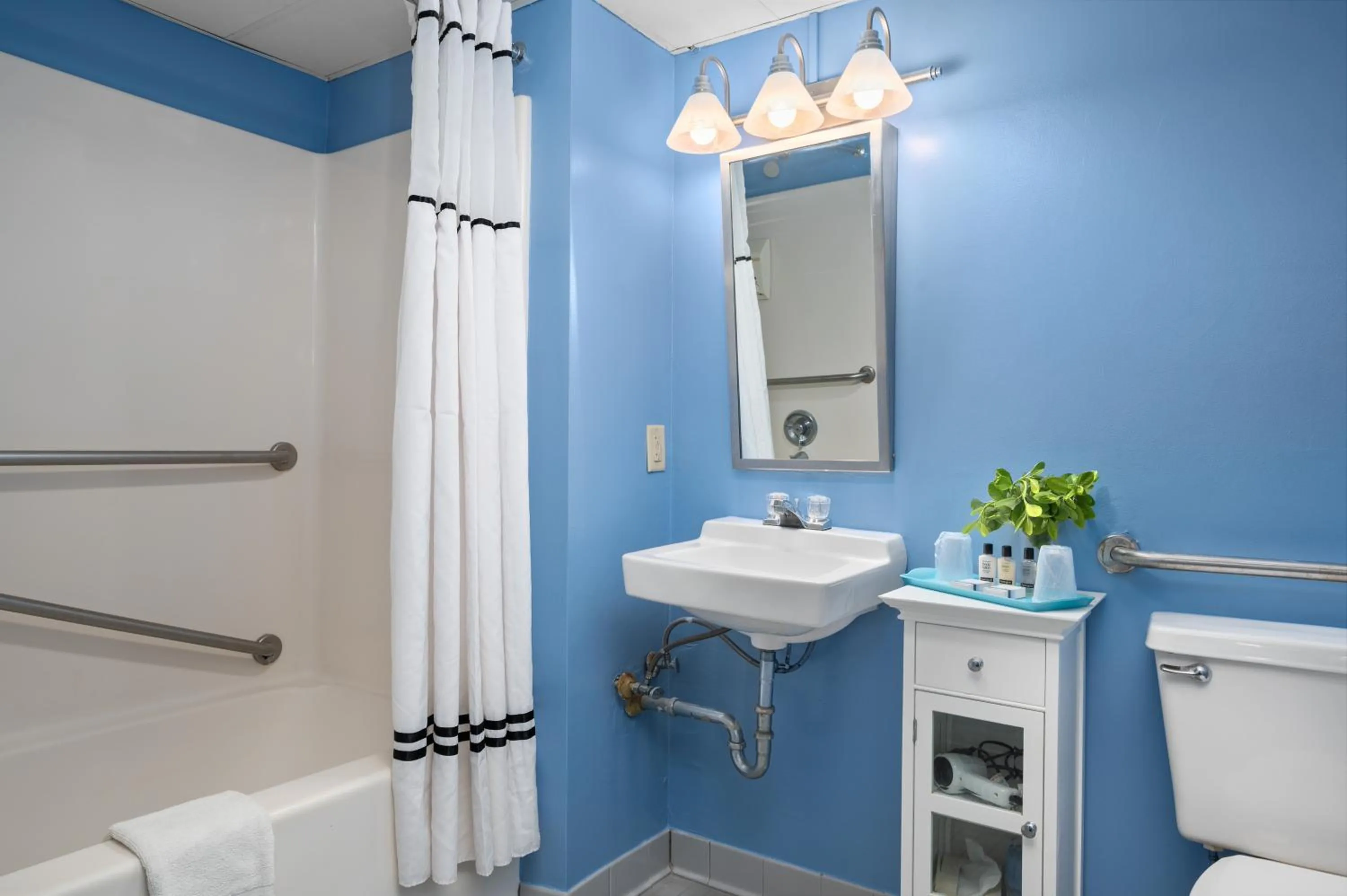 Bathroom in Cayman Suites Hotel