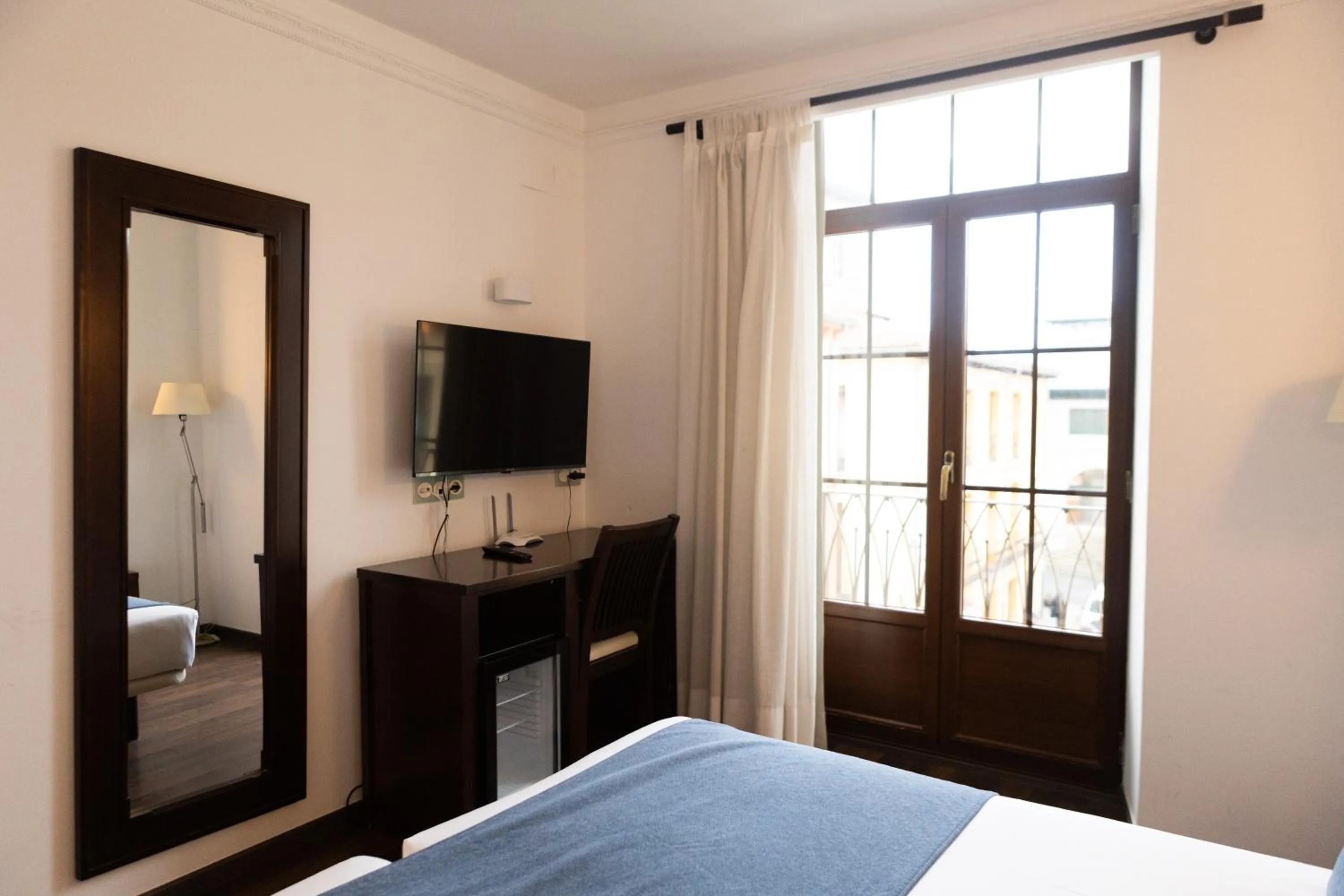 Bed in Hotel Rincón del Conde