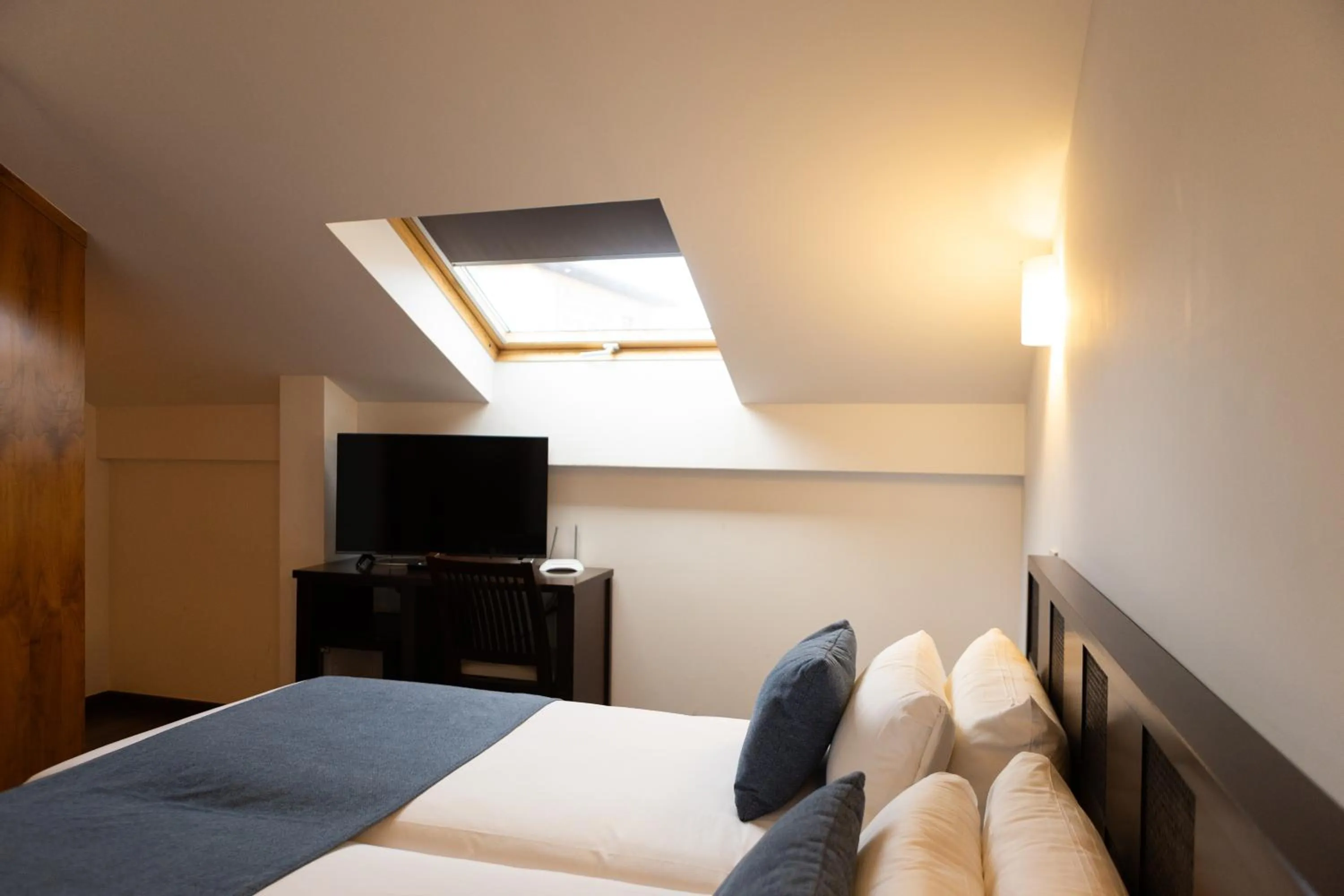 Bed in Hotel Rincón del Conde