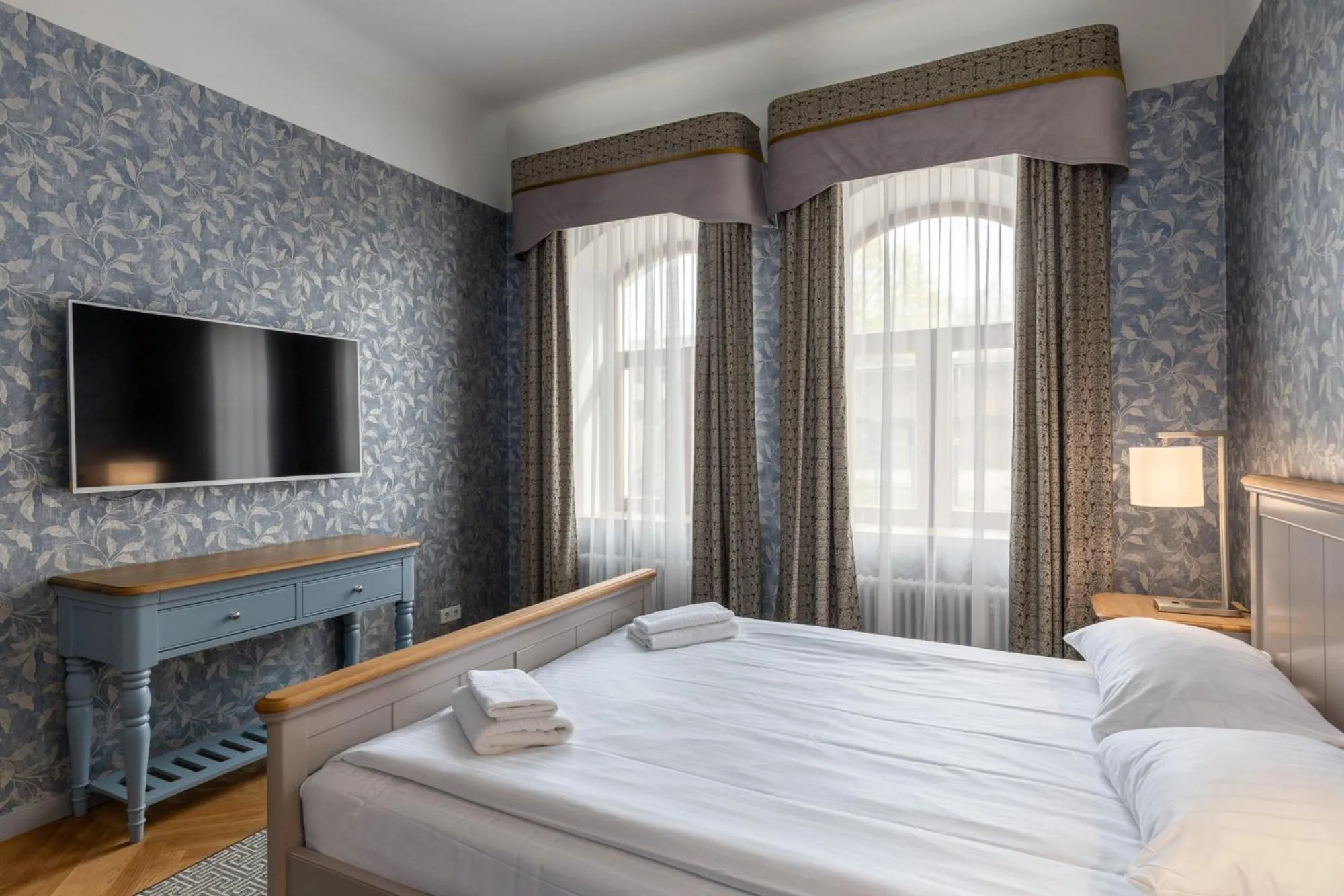 Bed in Roze Republikas Apartments