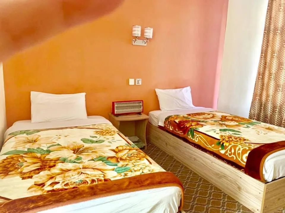 Bed in Hunza Panorama Hotel