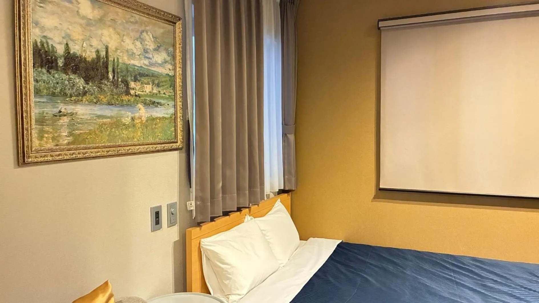 Photo of the whole room, Bed in GRAND BASE Hakataminami