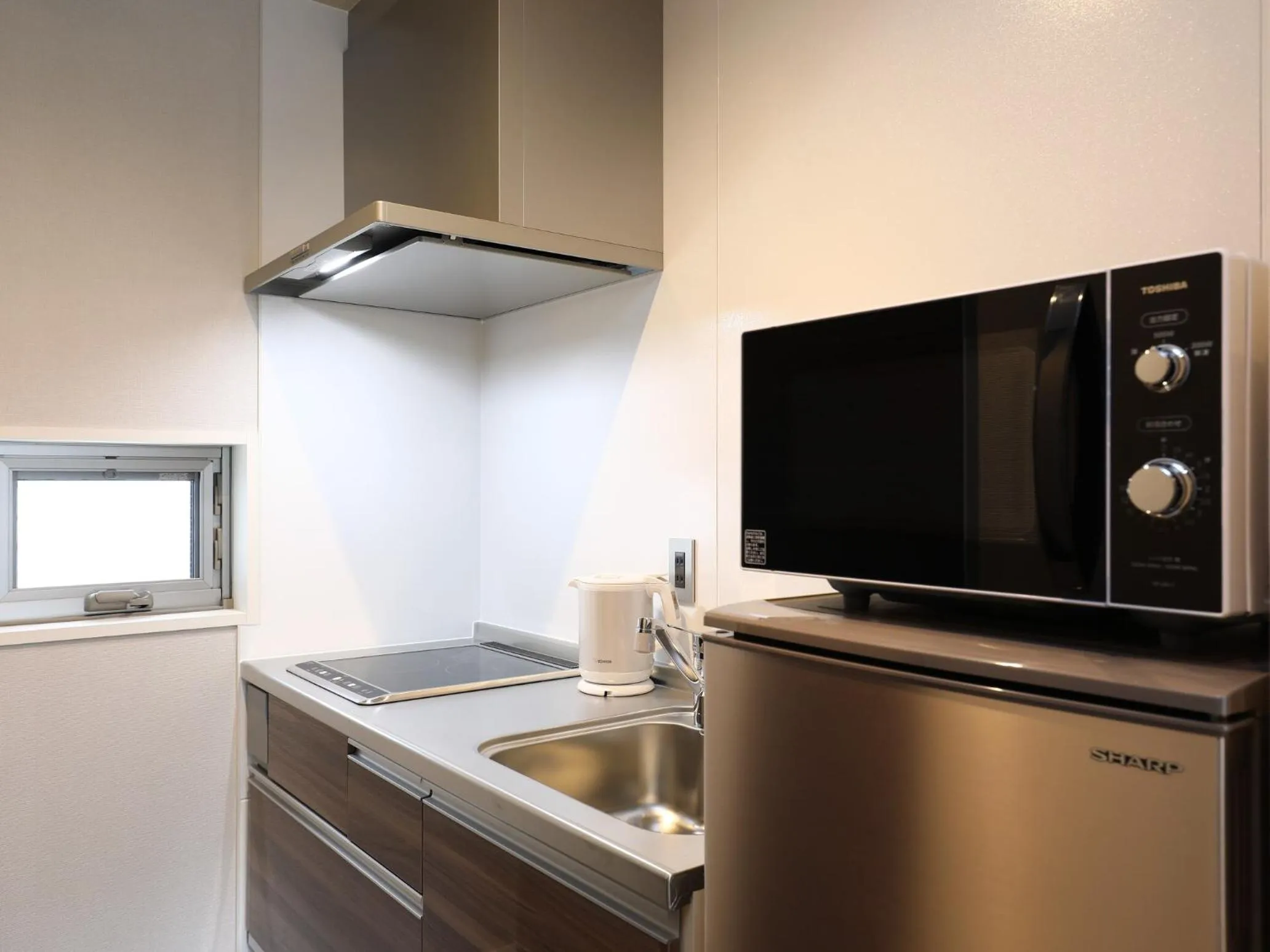 Kitchen or kitchenette in GRAND BASE Hakataminami