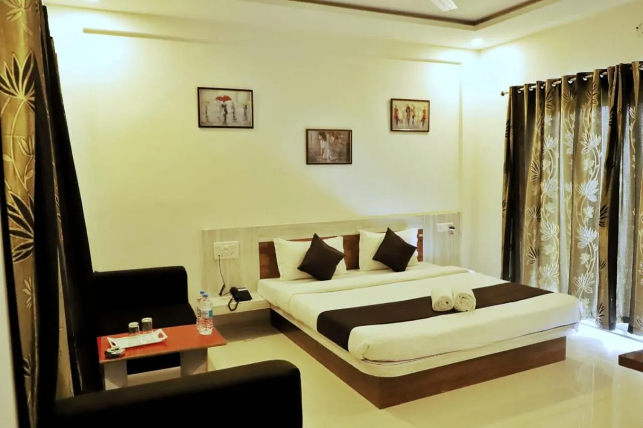 Bed in Hotel Green Exotica Mahabaleshwar