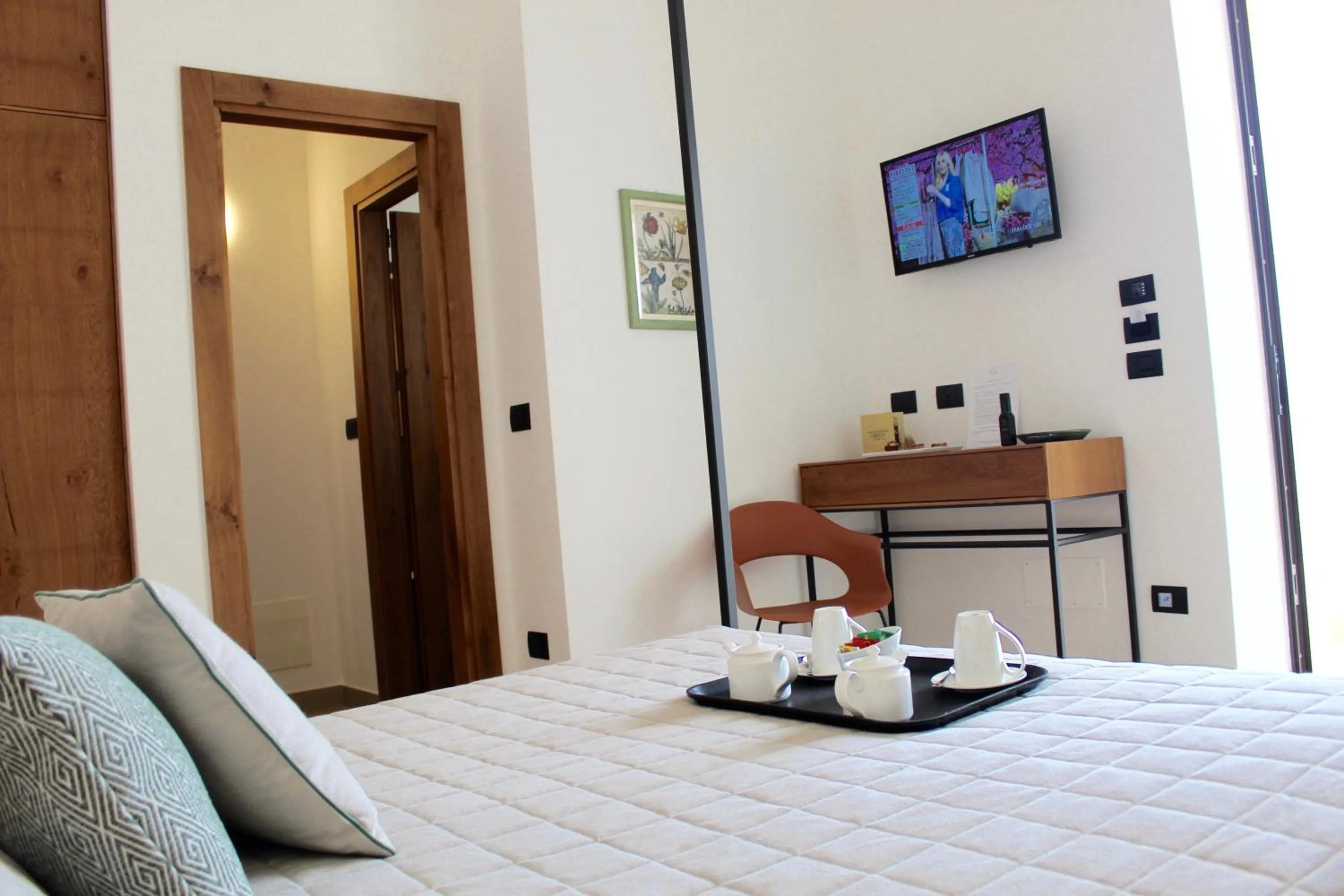 TV and multimedia, Bed in Masseria Rifisa AgriResort
