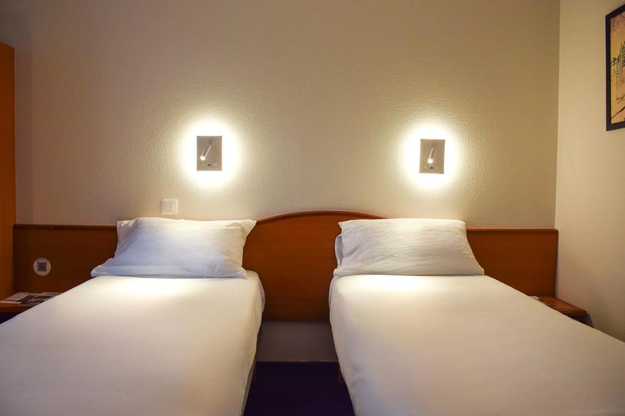 Bedroom, Bed in B&B HOTEL Rodez Bourran