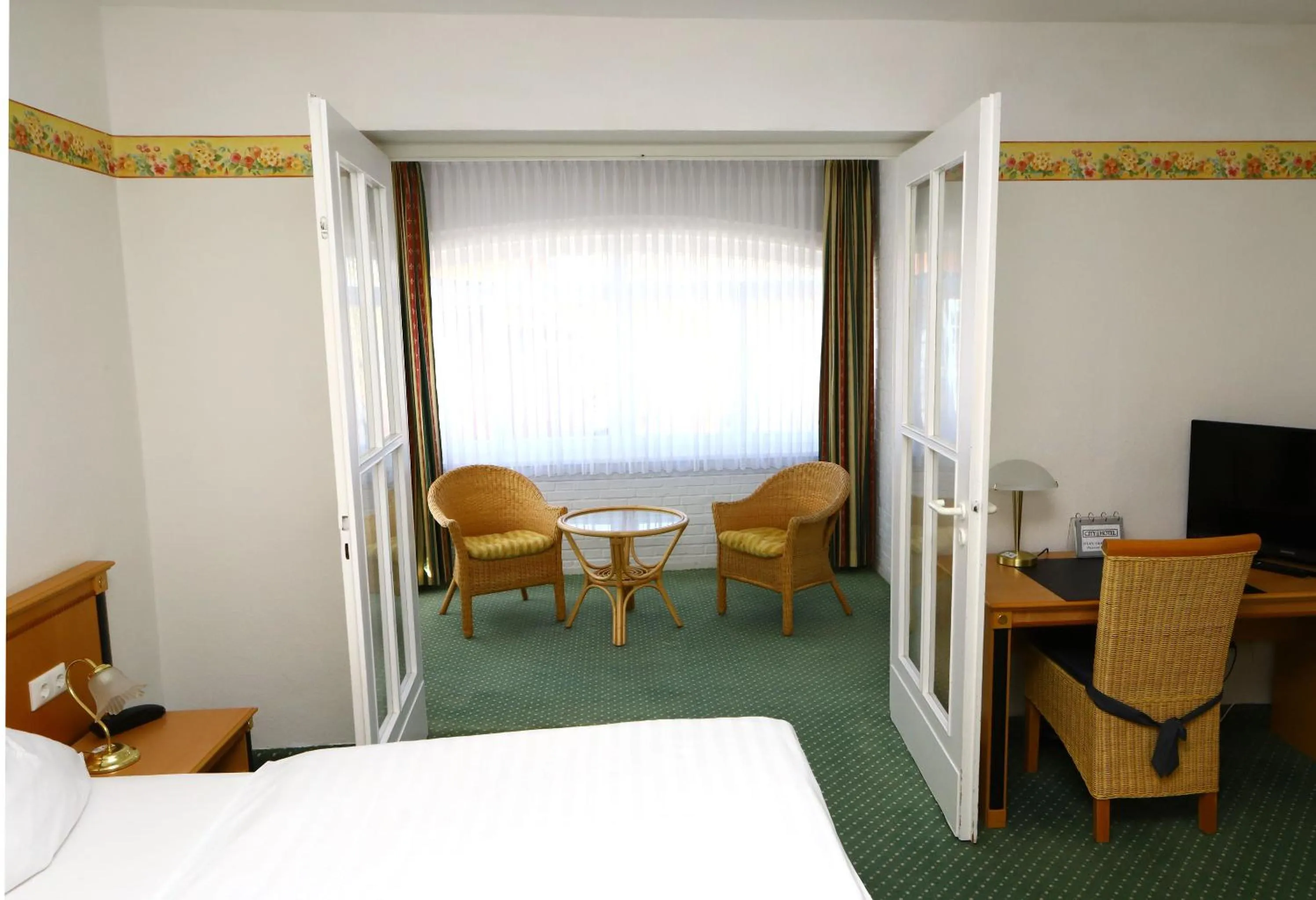 Photo of the whole room, Bed in City Hotel