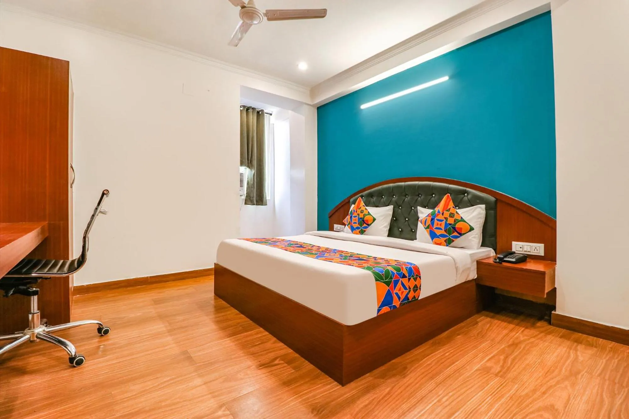 Bed in FabHotel Lime Tree Near Yashobhoomi Convention Centre