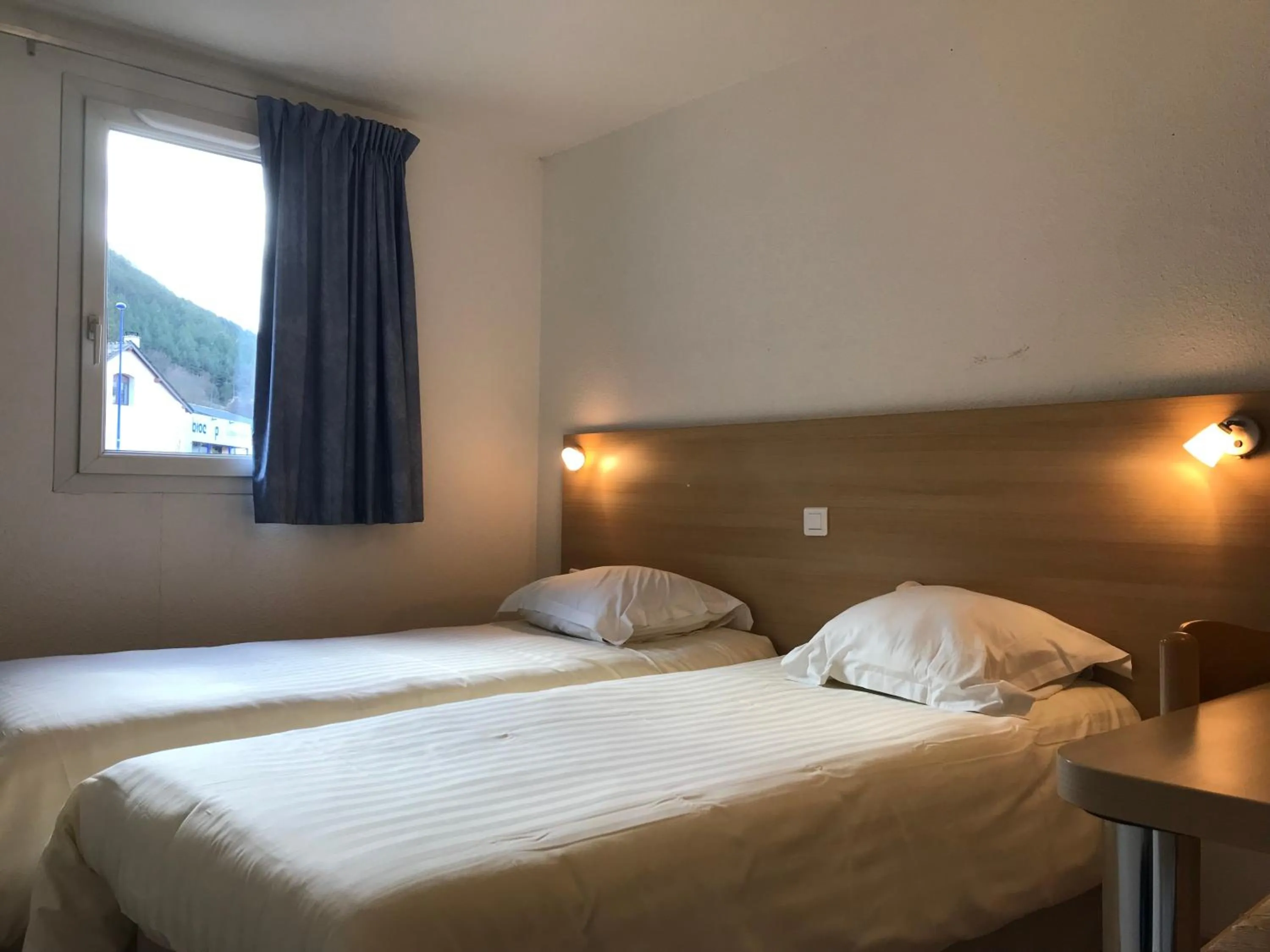 Photo of the whole room, Bed in Brit Hotel Essentiel Deltour Mende