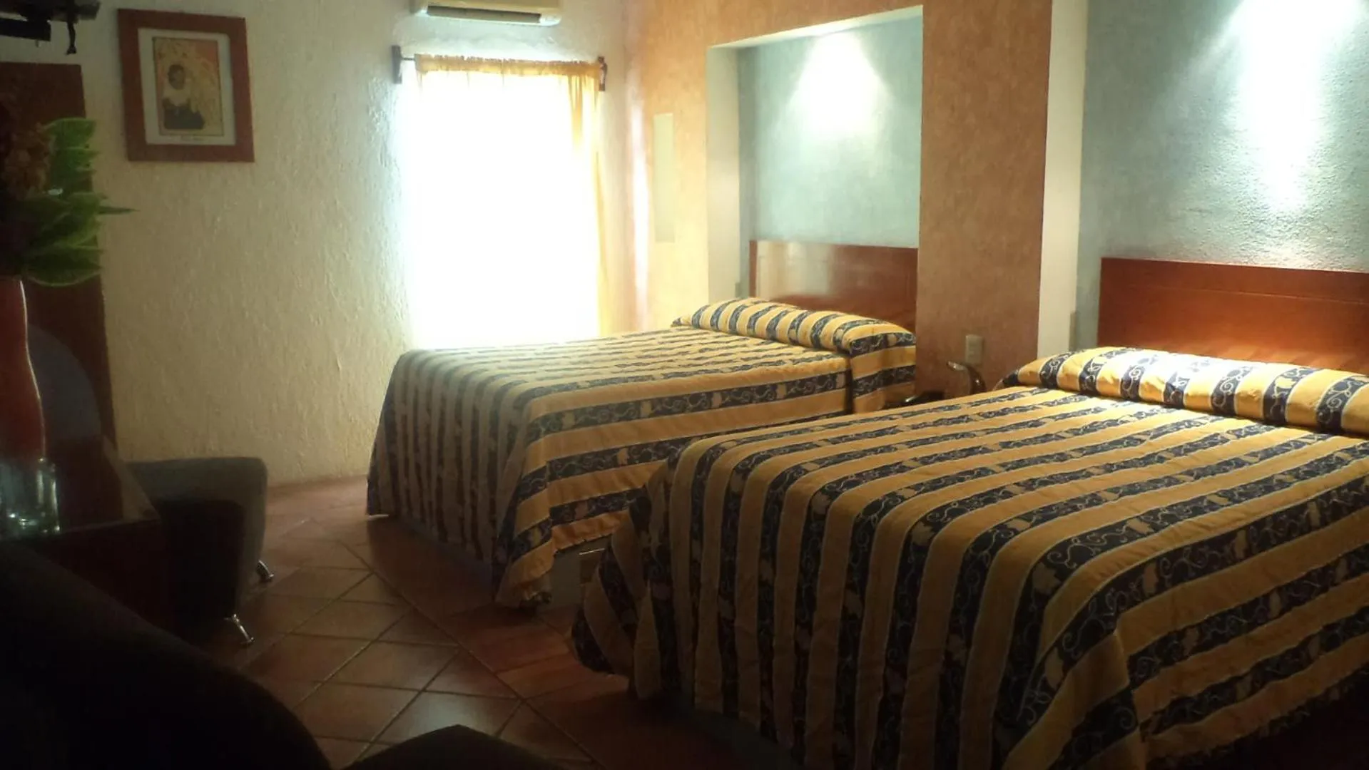 Bed in Hotel La Rienda Mision Tequillan