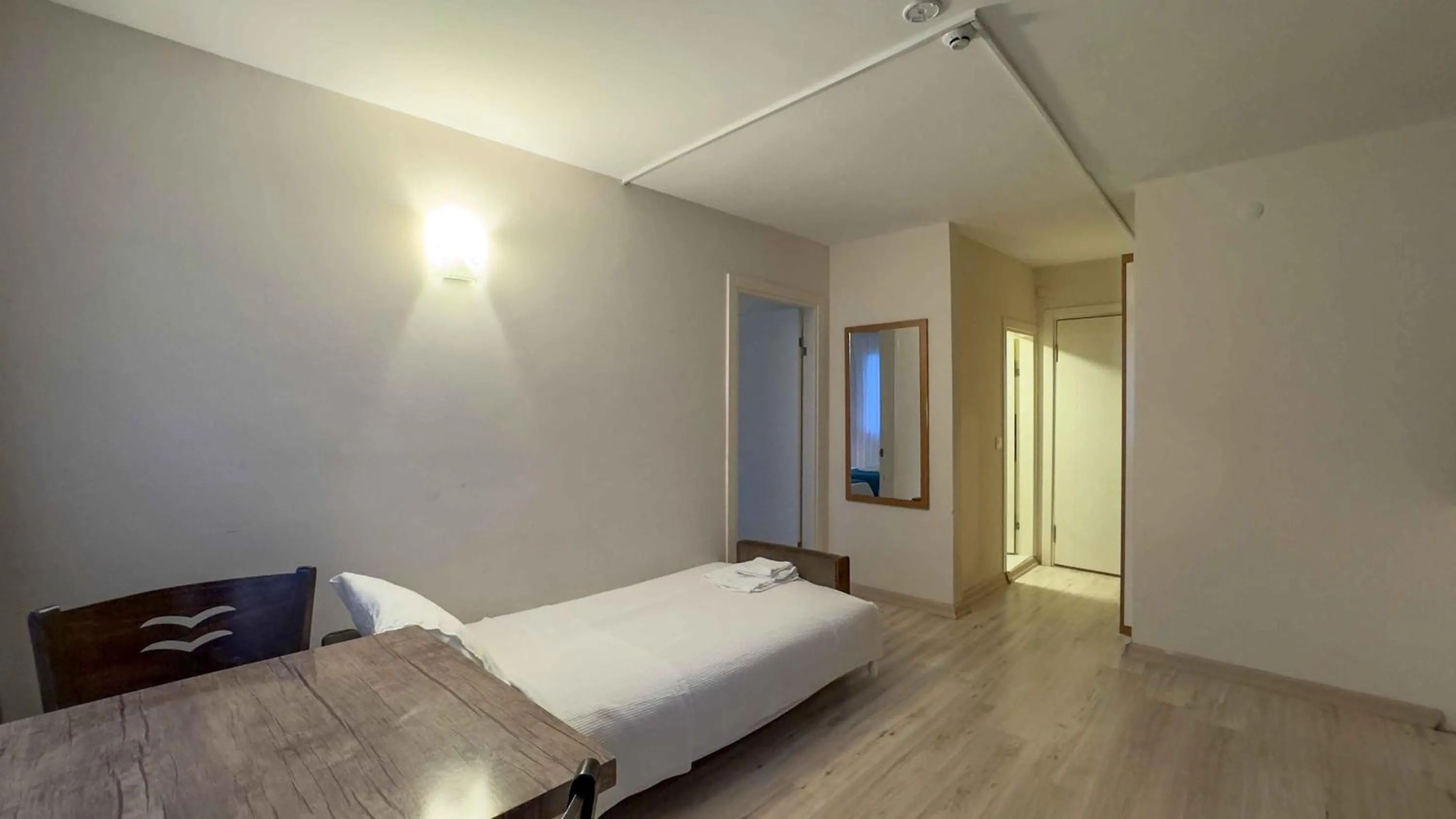 Living room, Bed in La Bella Suit Otel