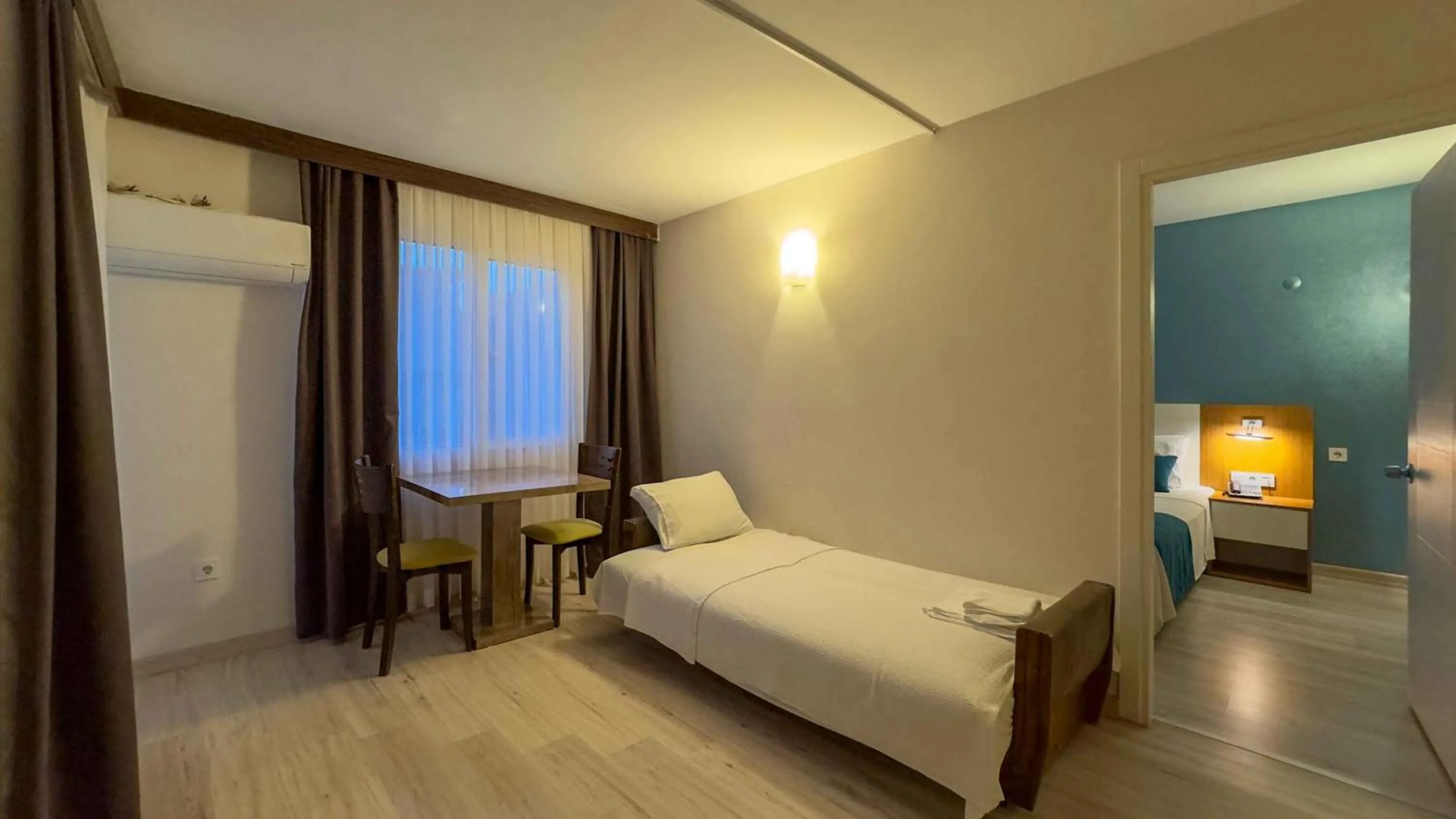 Living room, Bed in La Bella Suit Otel