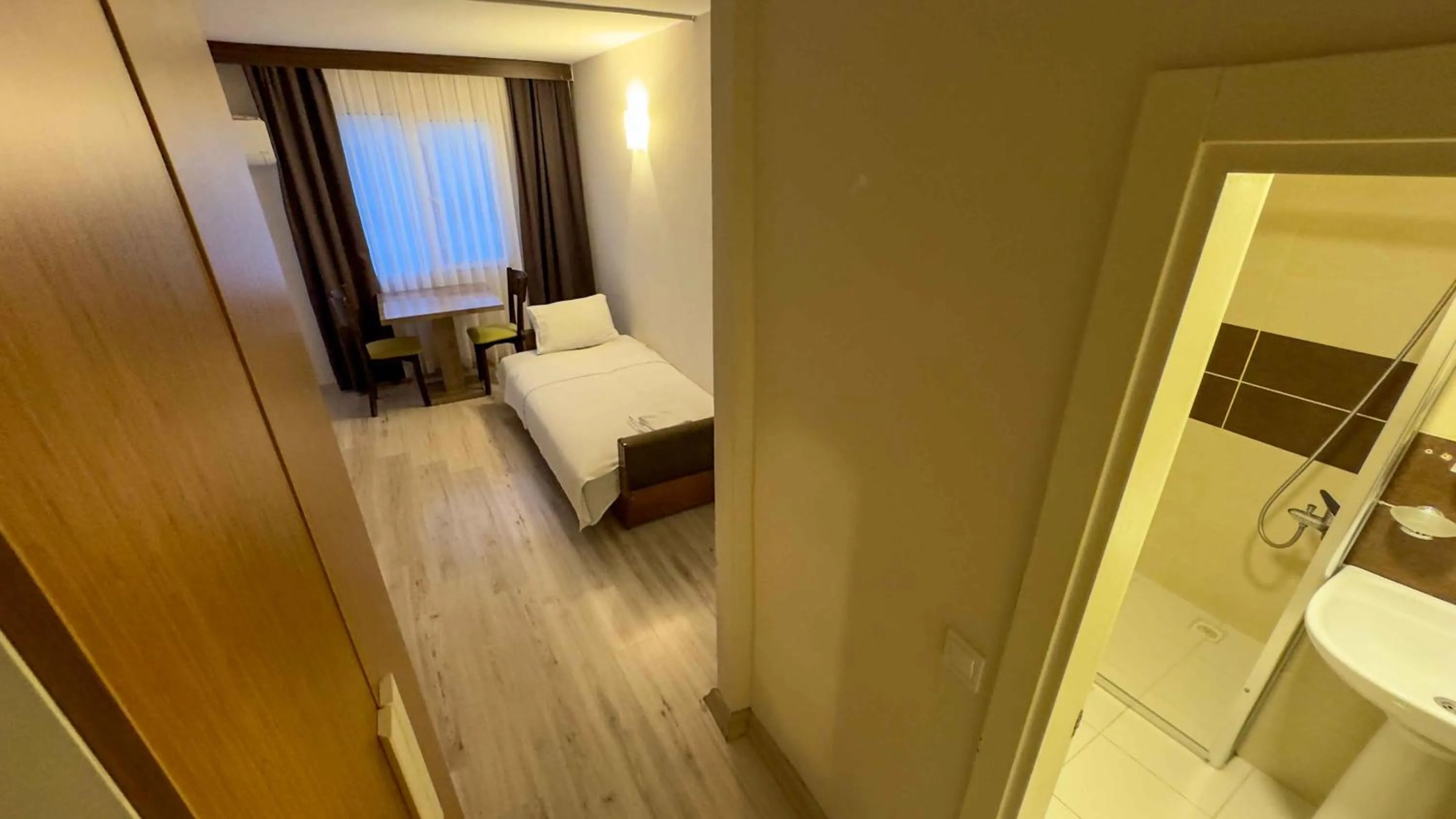 Living room, Bed in La Bella Suit Otel