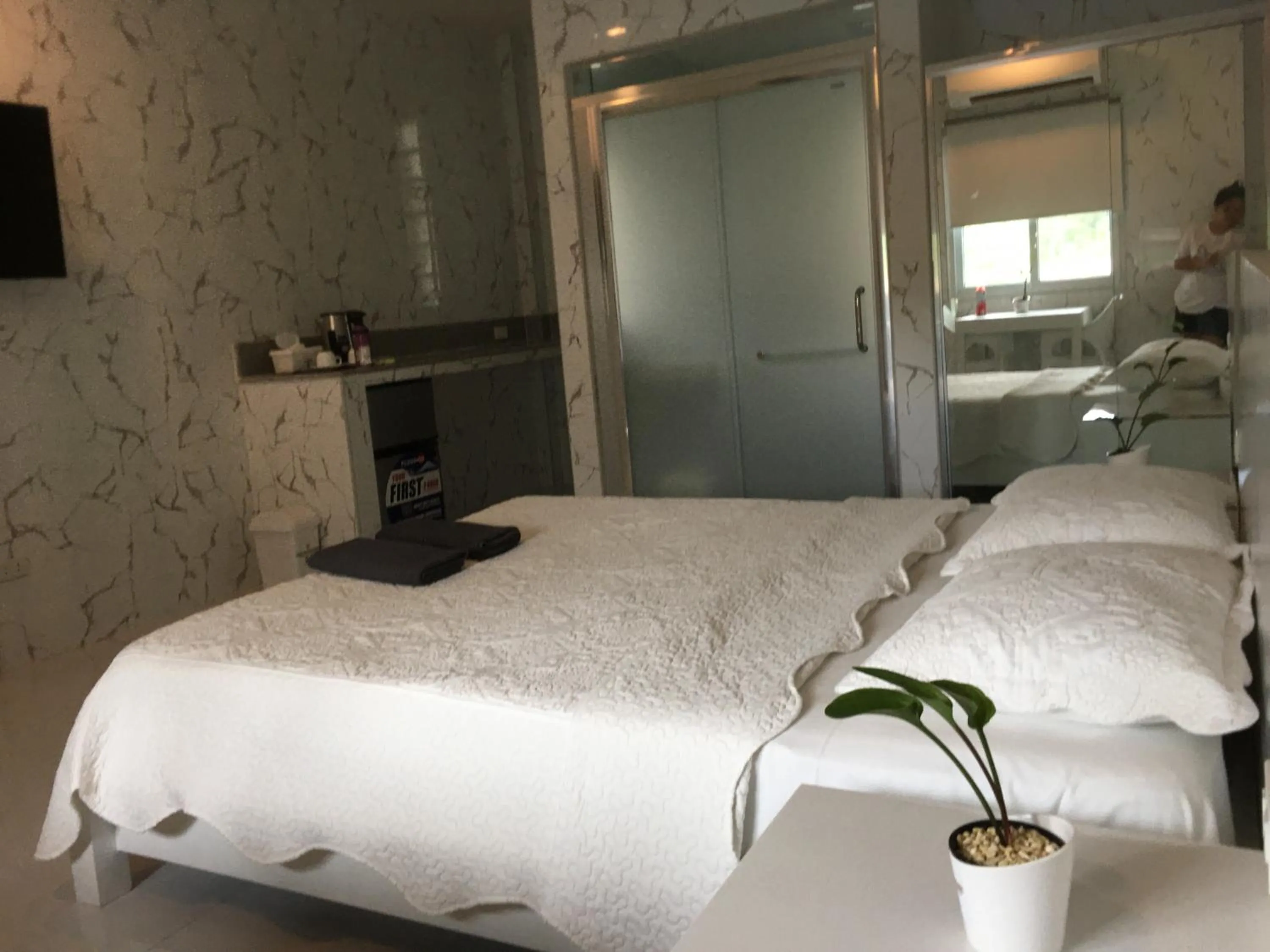 Bed in Sena Gladyz Suites