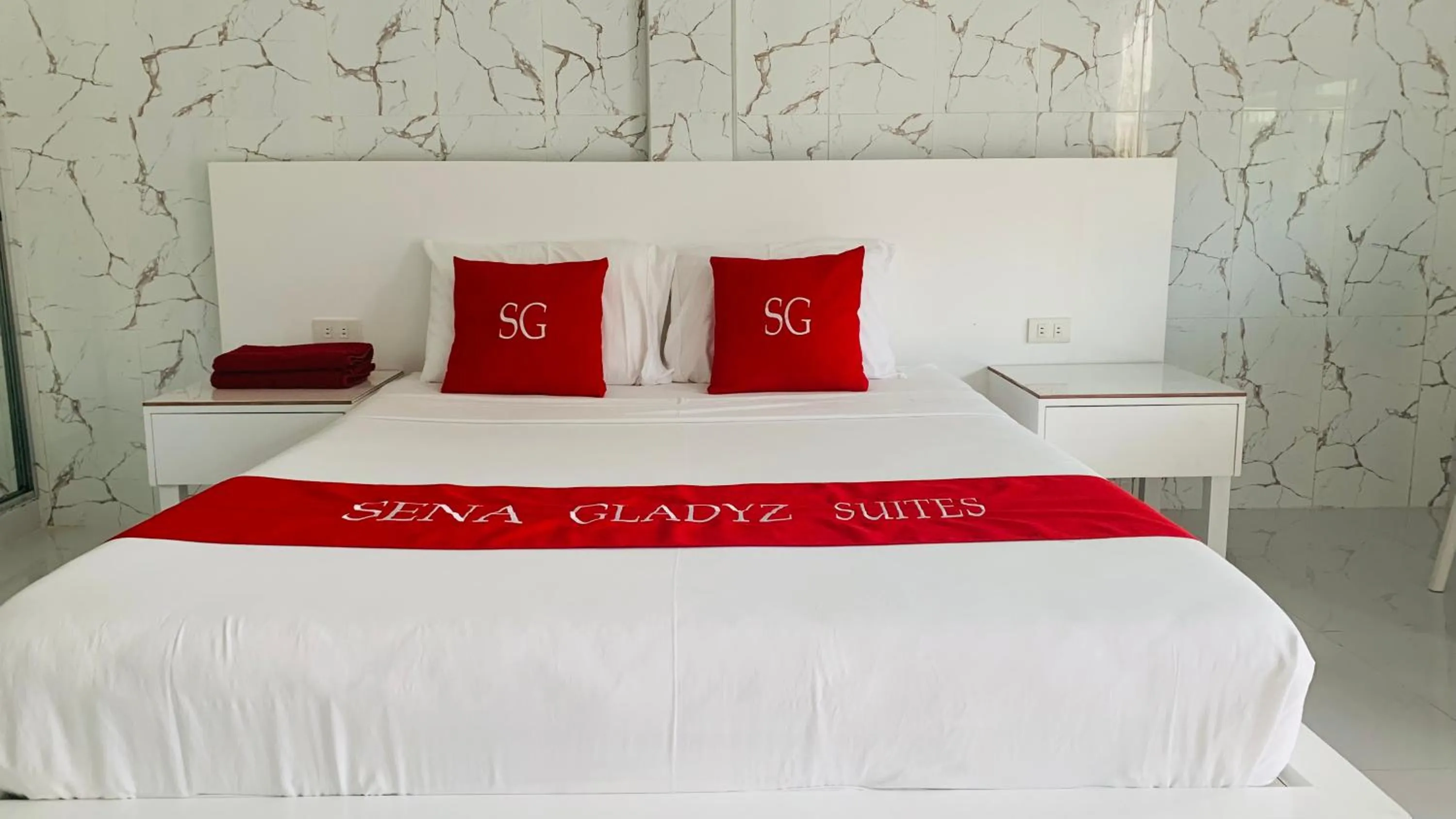 Bed in Sena Gladyz Suites