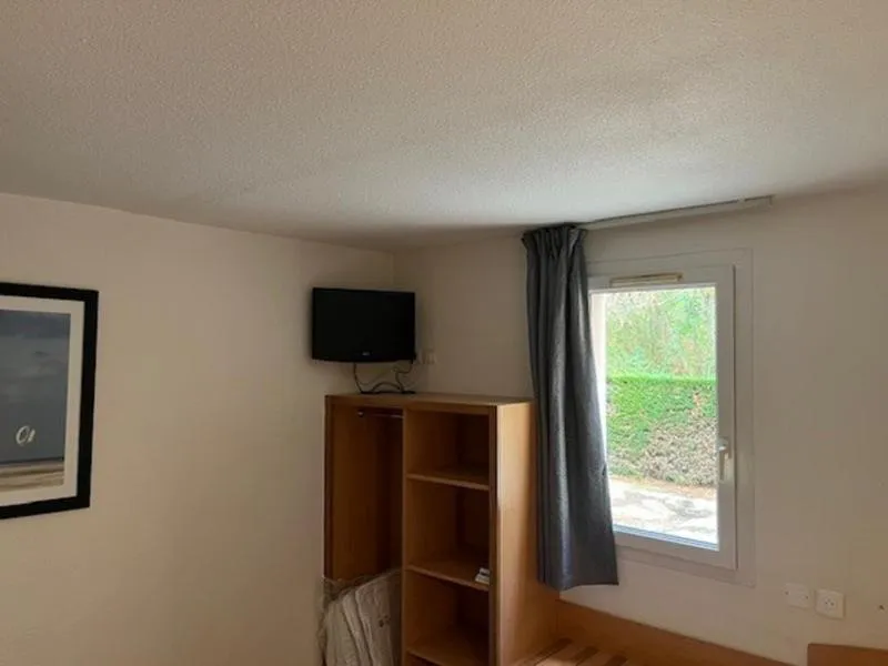 Living room in Brit Hotel Essentiel Millau