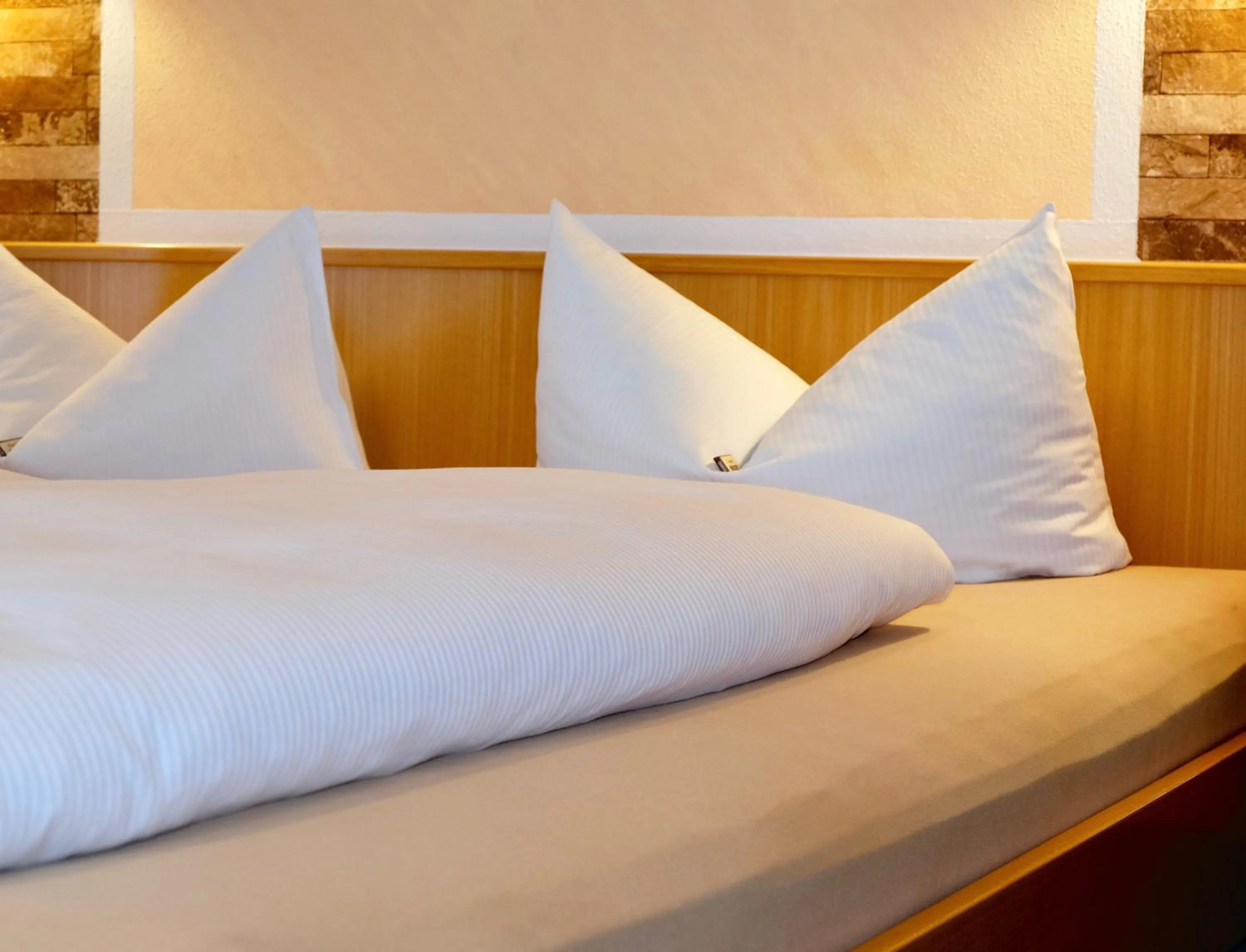 Bed in Gästehaus Biedermann