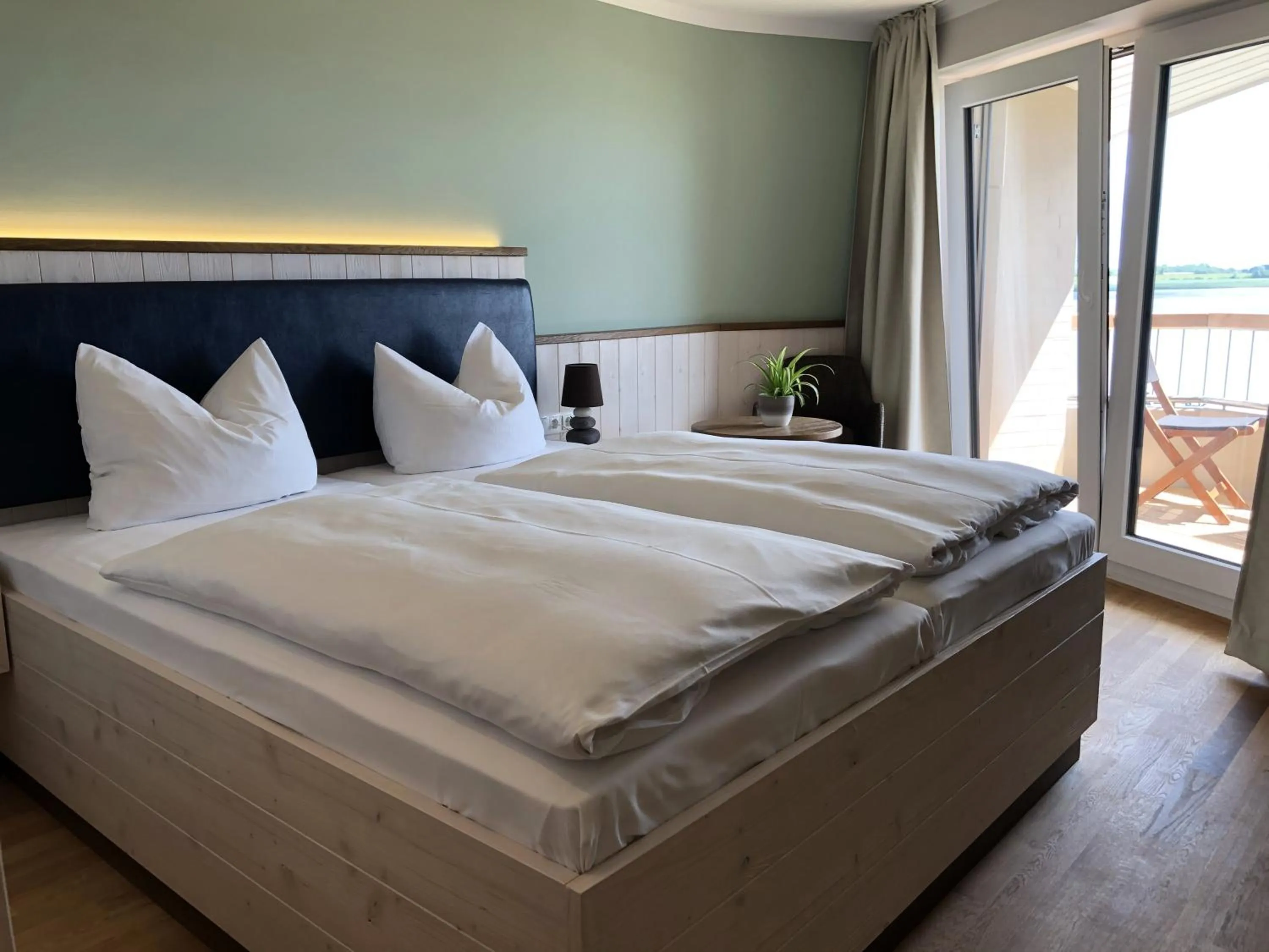 Photo of the whole room, Bed in BE BIO Hotel be natural - direkt am Wasser