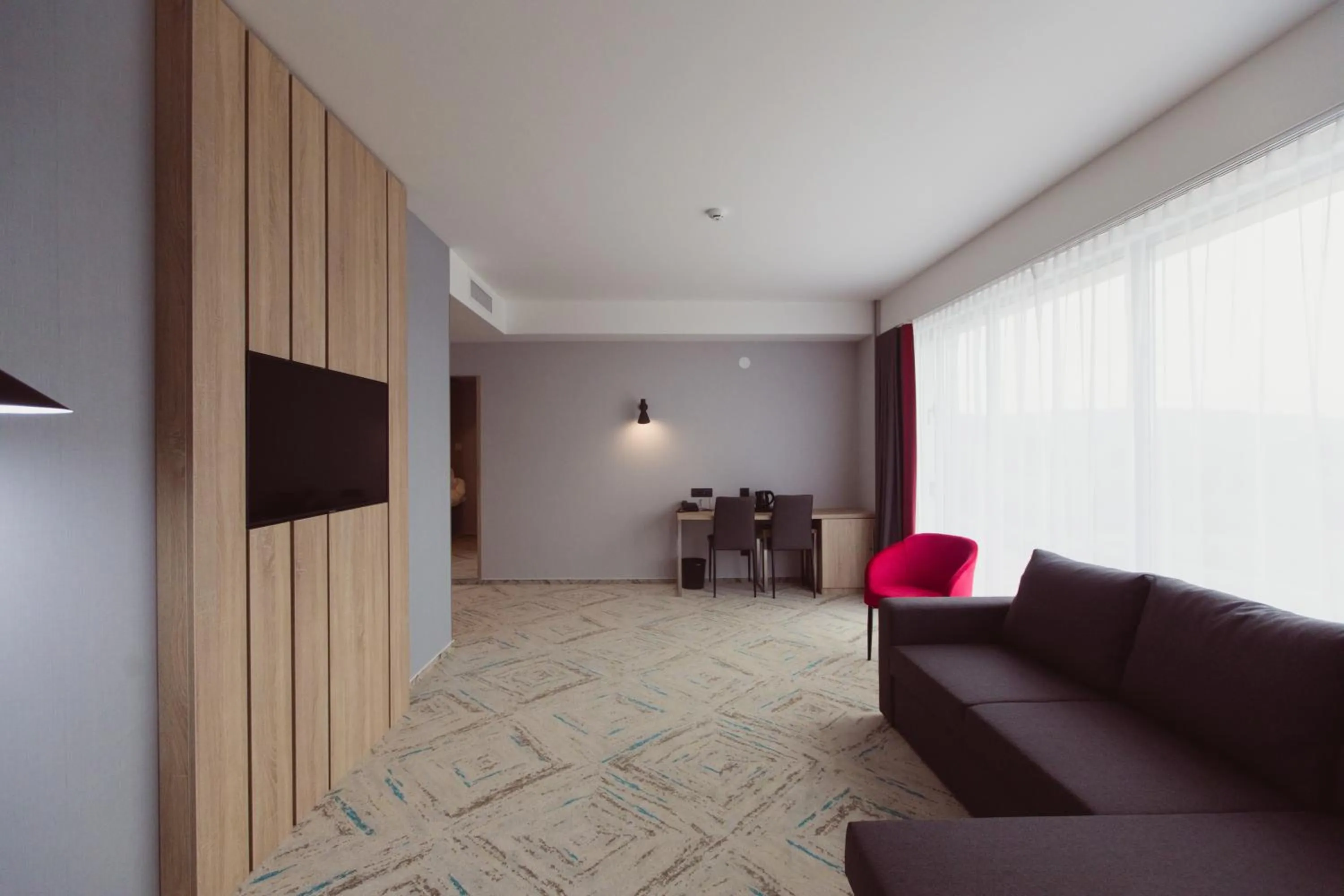 Living room in Ramada by Wyndham Targu Jiu