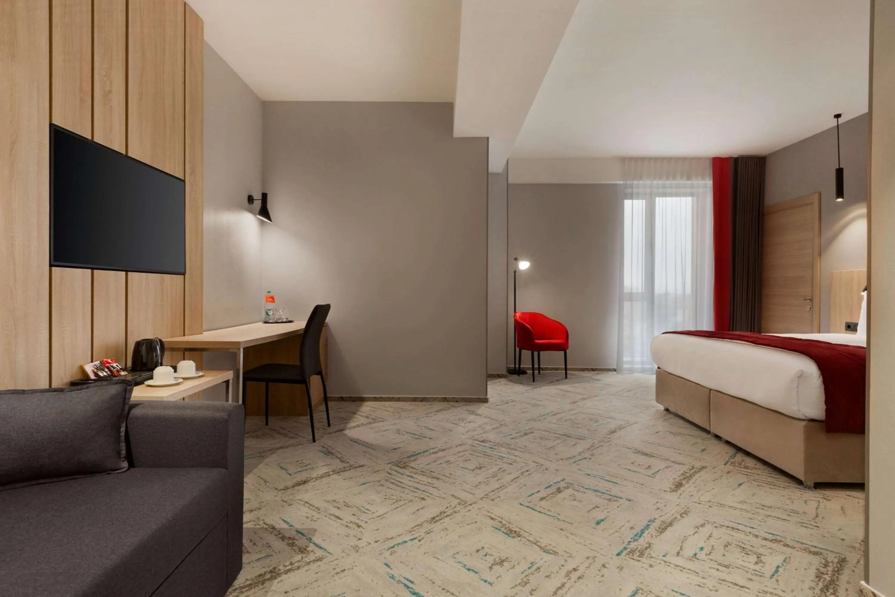 Photo of the whole room, Bed in Ramada by Wyndham Targu Jiu