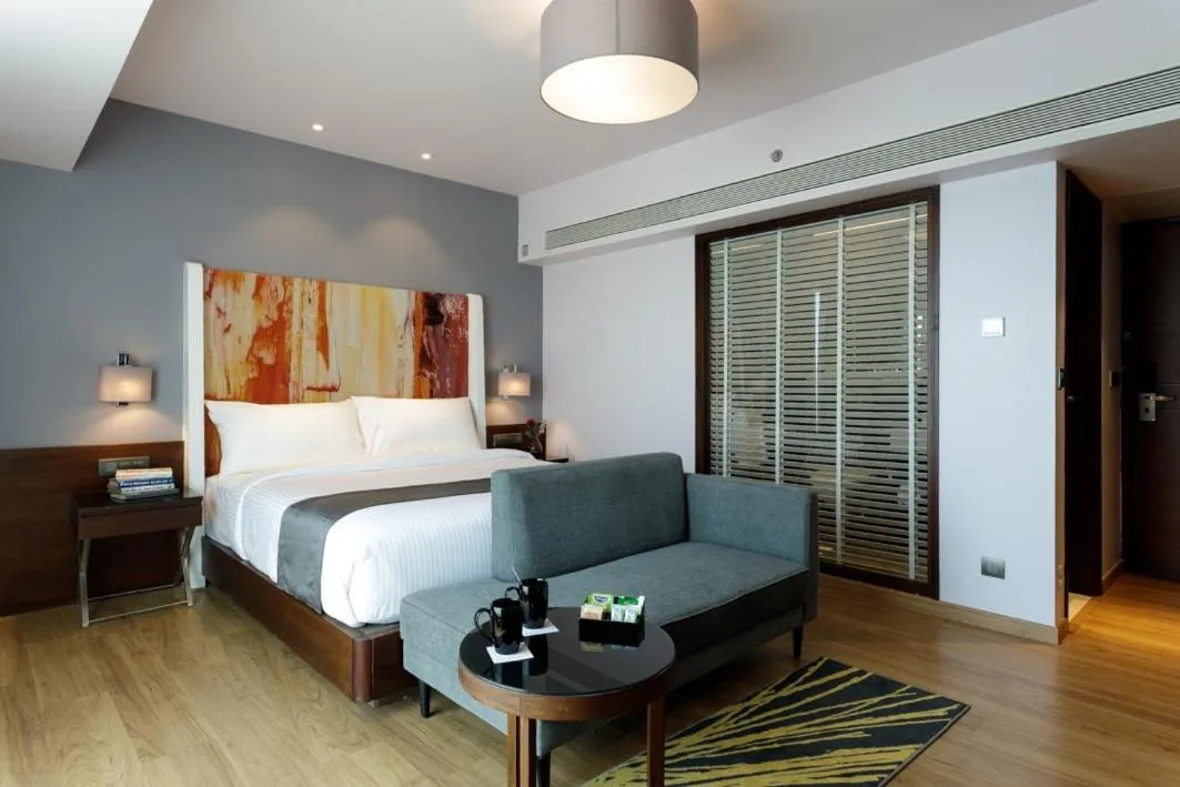 Photo of the whole room, Bed in Svenska Design Hotel Kakinada