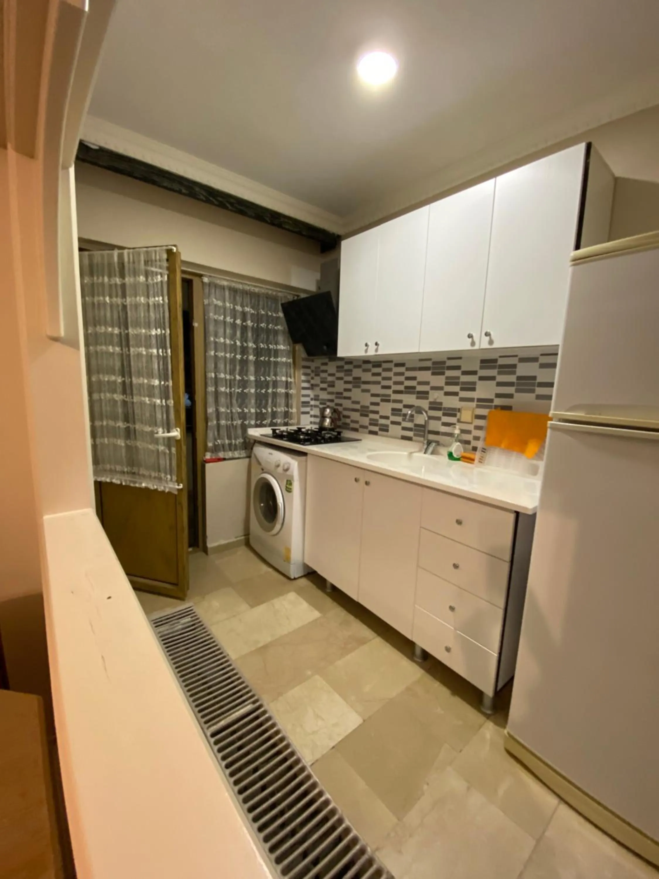 Kitchen or kitchenette in EVİM APART HOTEL