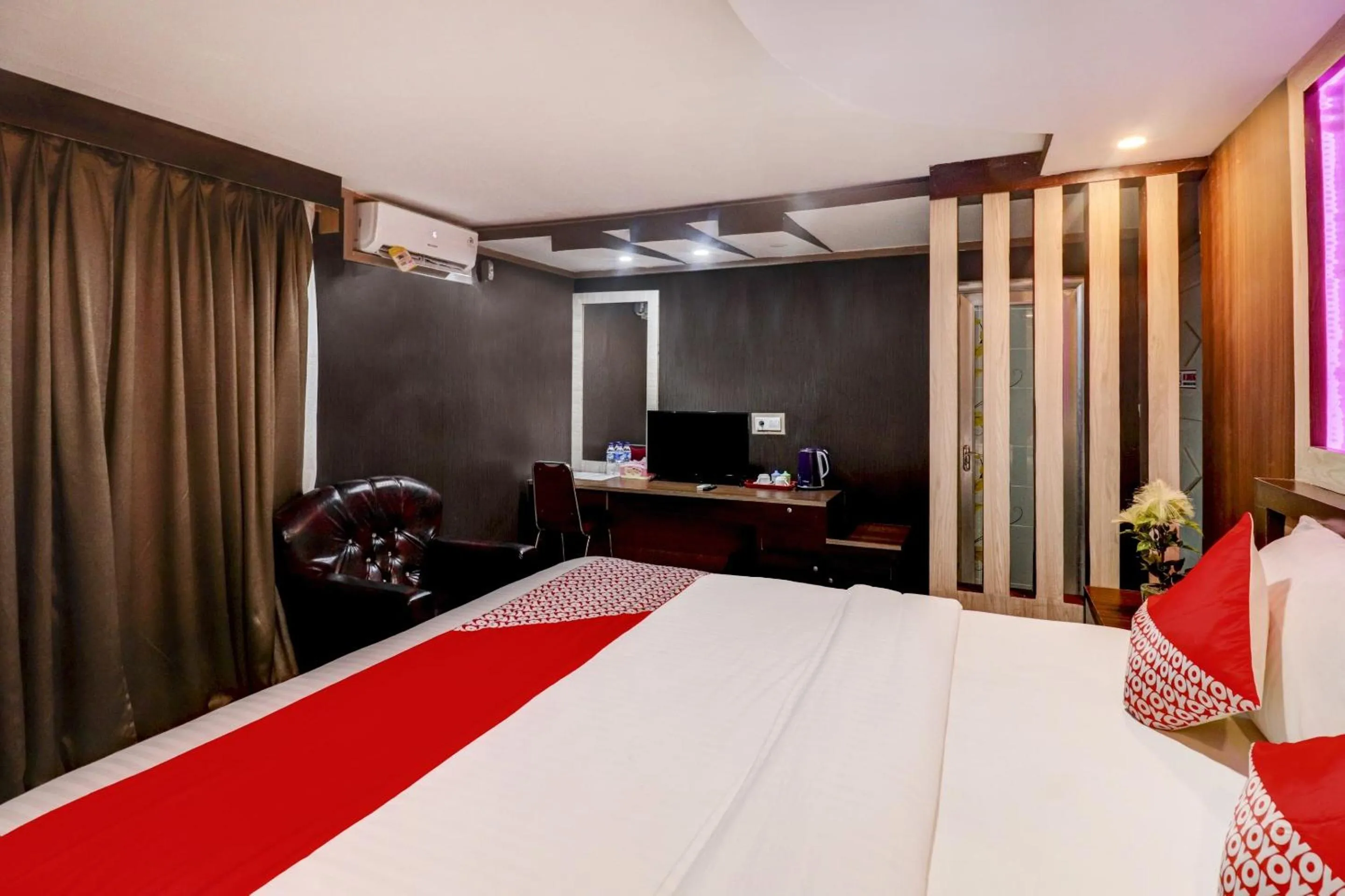 Bedroom in Collection O 90564 Hotel Merangin Syariah