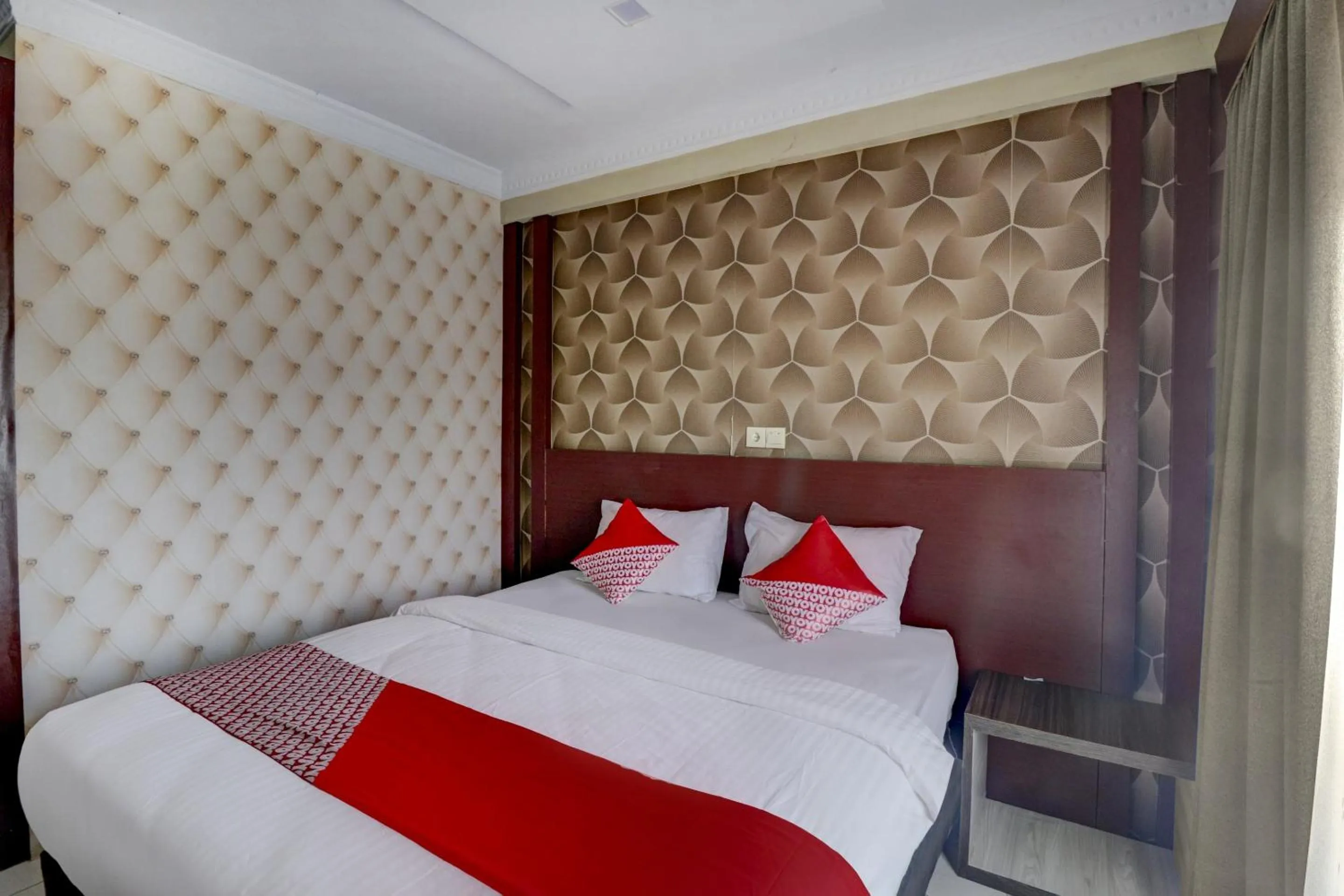 Bedroom in Collection O 90564 Hotel Merangin Syariah