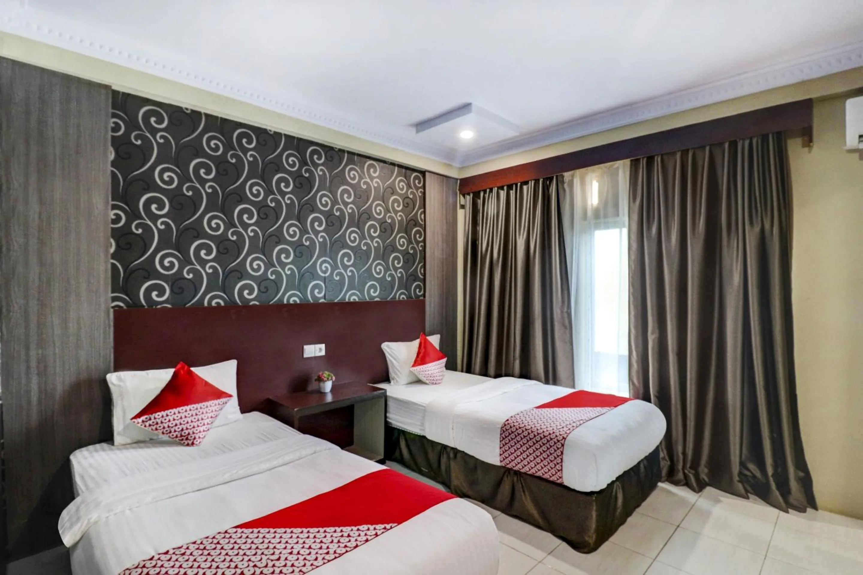 Bedroom in Collection O 90564 Hotel Merangin Syariah