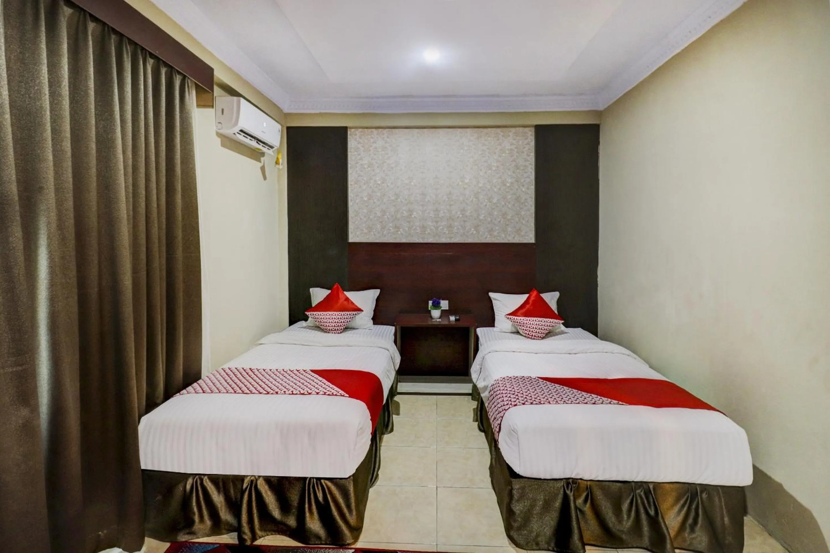 Bedroom in Collection O 90564 Hotel Merangin Syariah