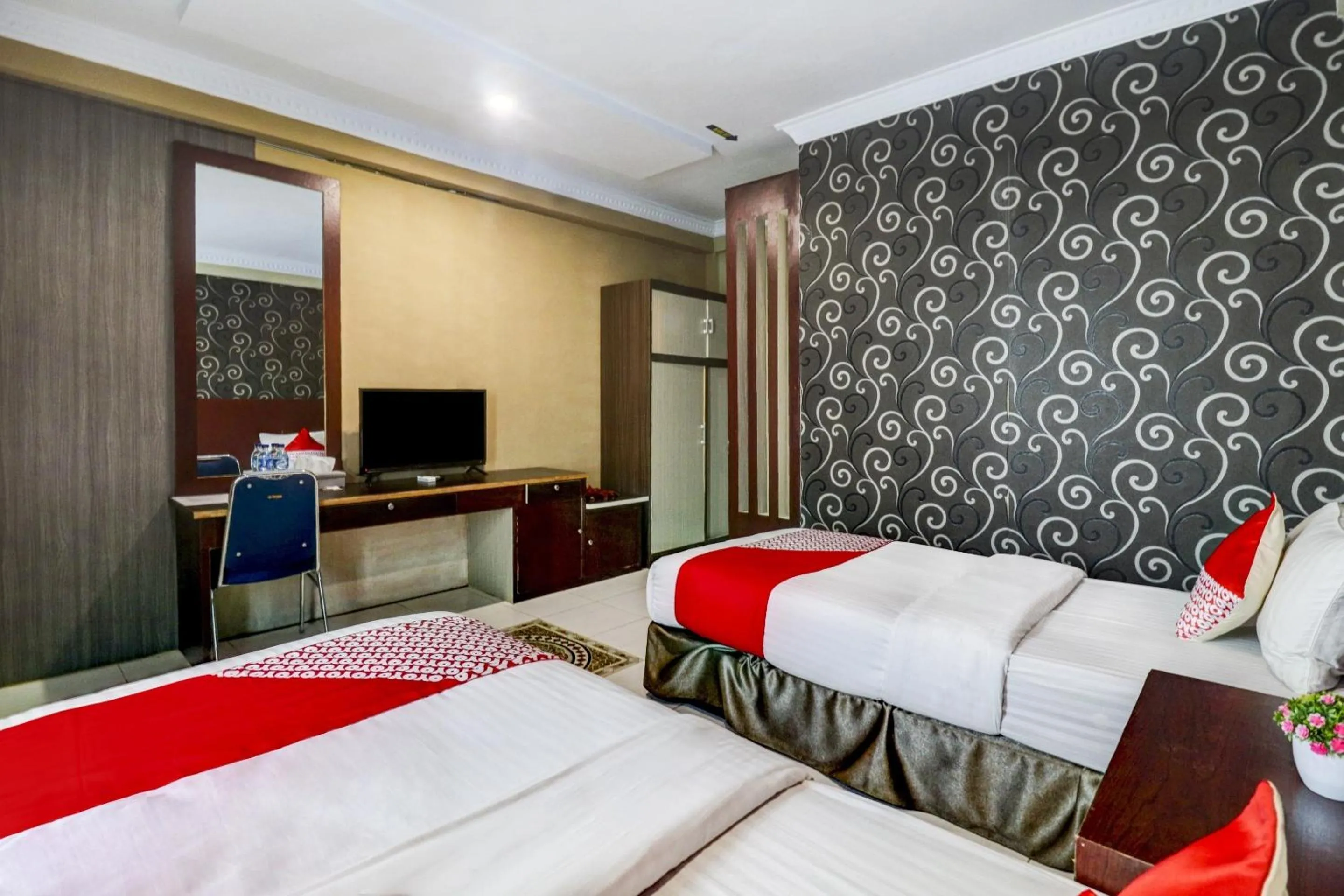 Bedroom in Collection O 90564 Hotel Merangin Syariah