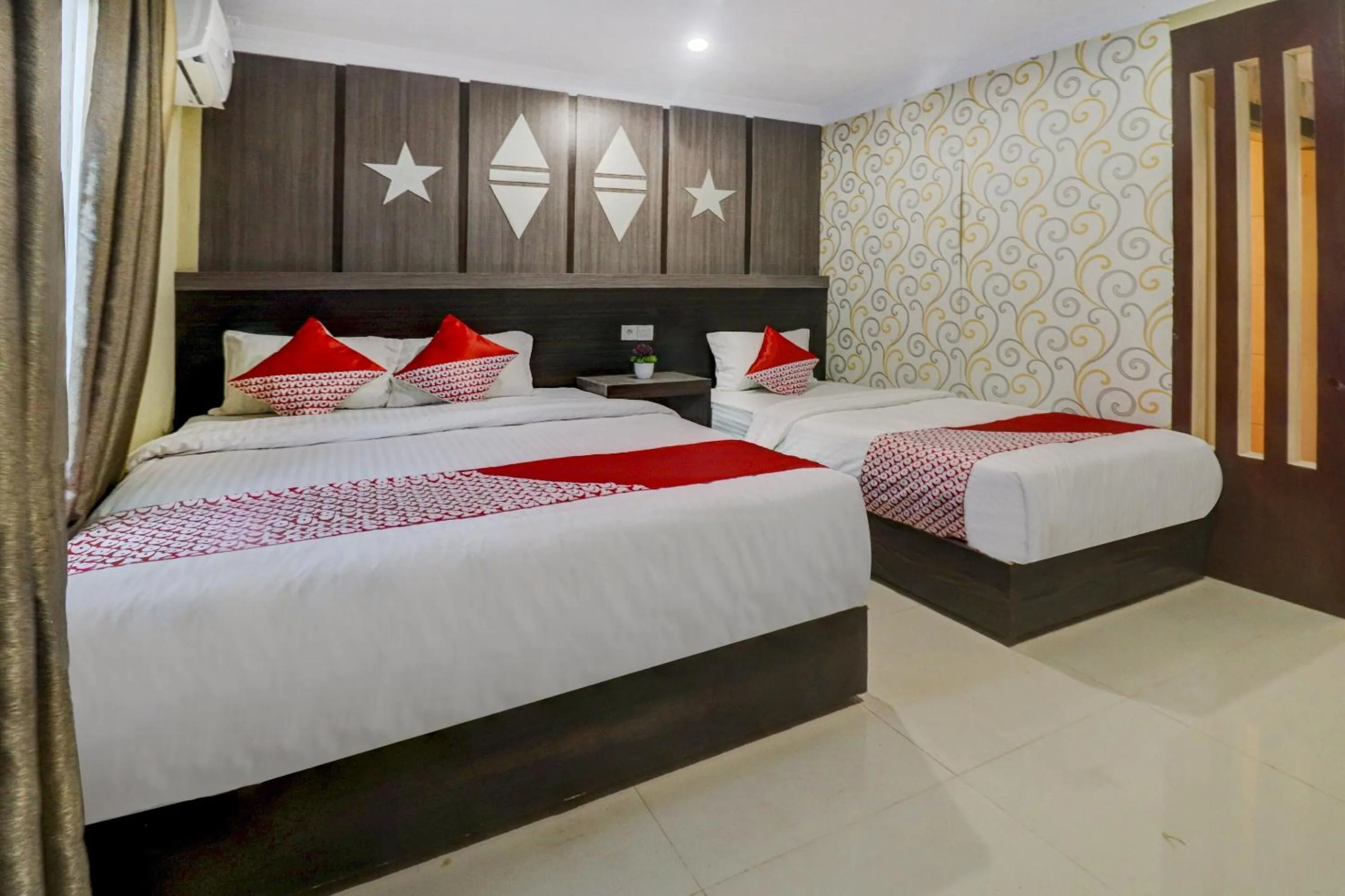 Bedroom in Collection O 90564 Hotel Merangin Syariah