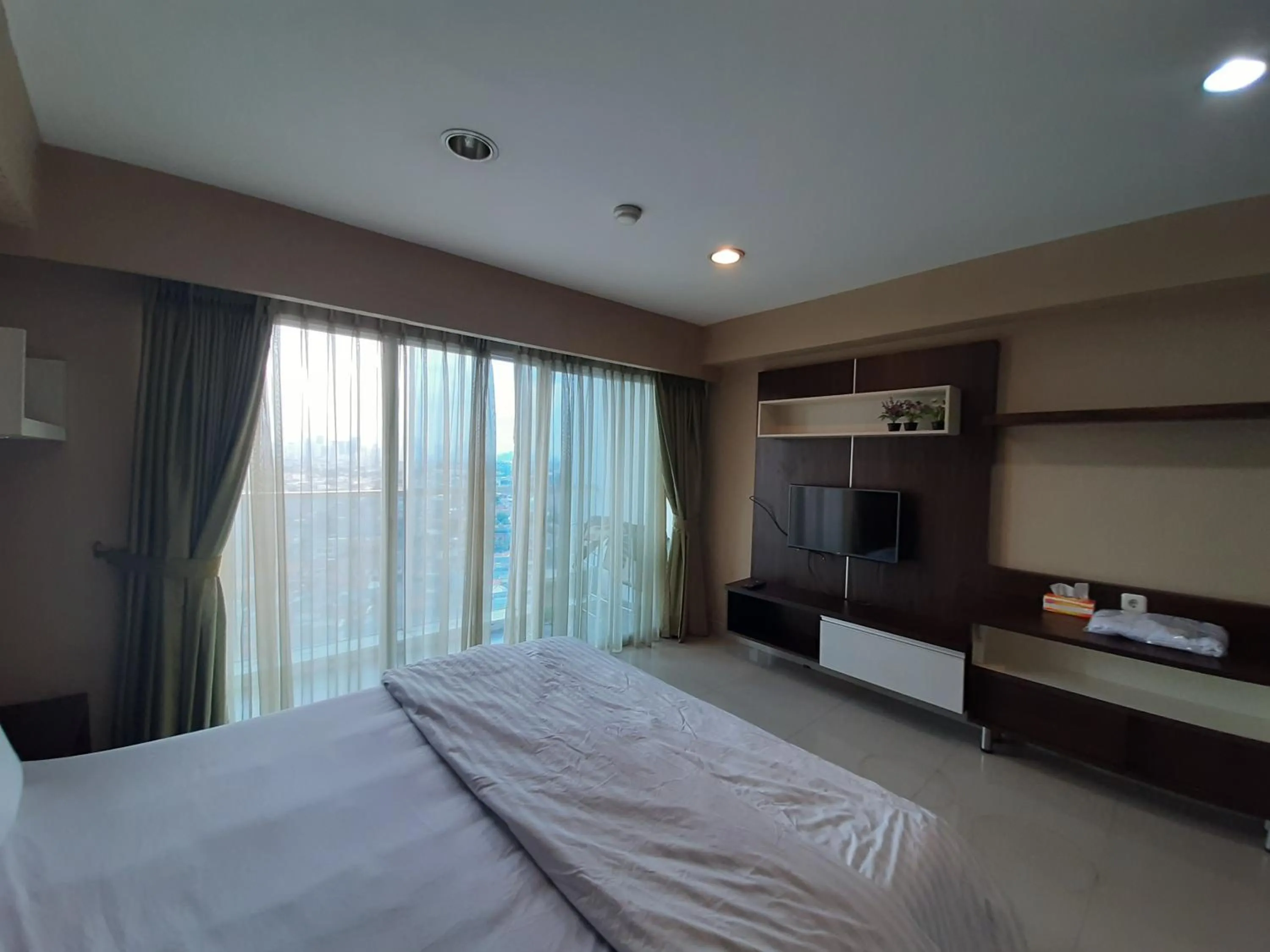 Bedroom, Bed in Cozy Tamansari Hive Cawang by Bonzela Property