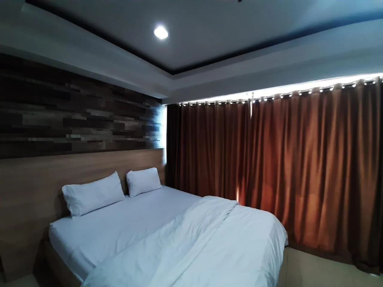 Bed in Cozy Tamansari Hive Cawang by Bonzela Property