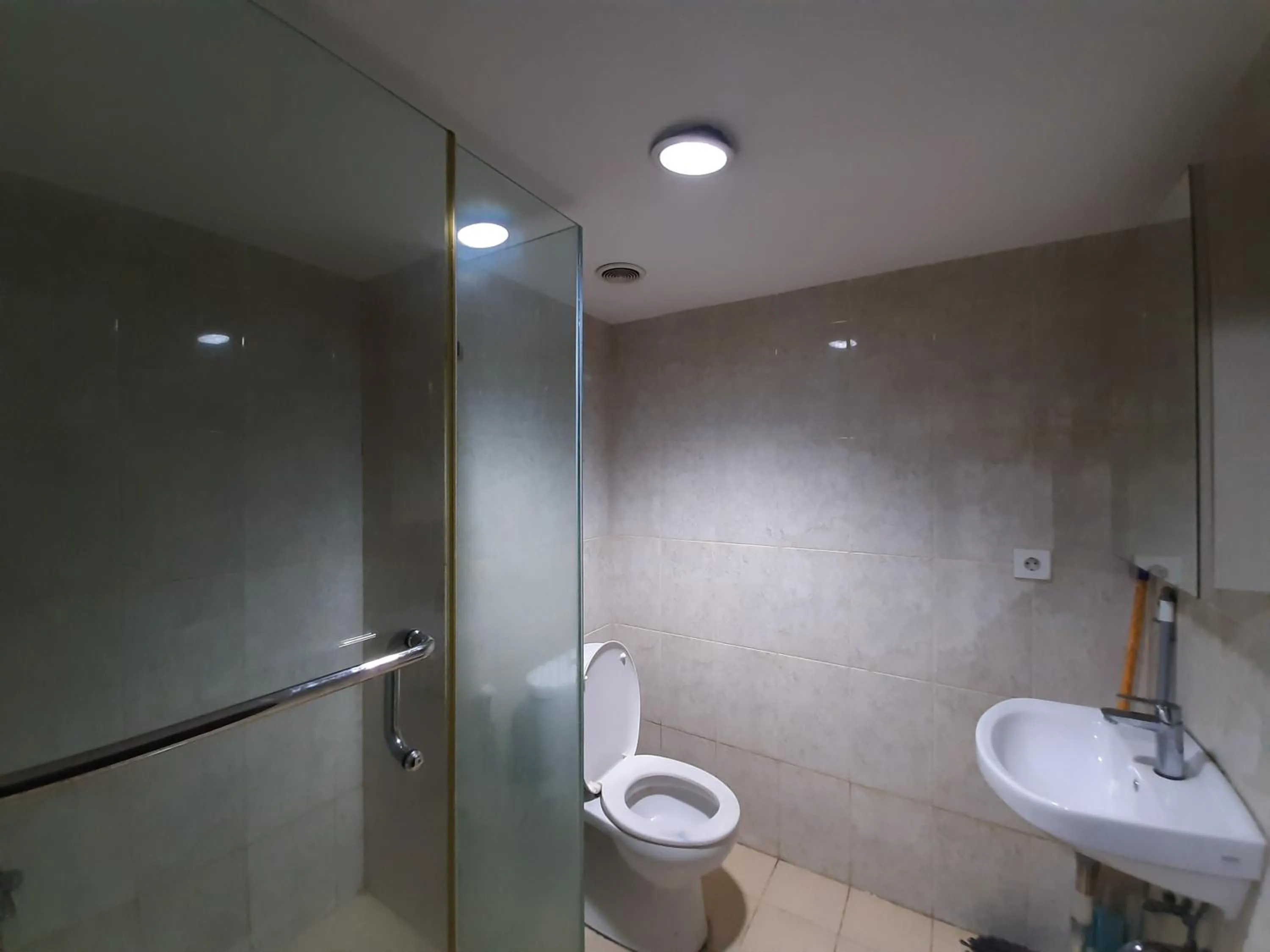 Bathroom in Cozy Tamansari Hive Cawang by Bonzela Property