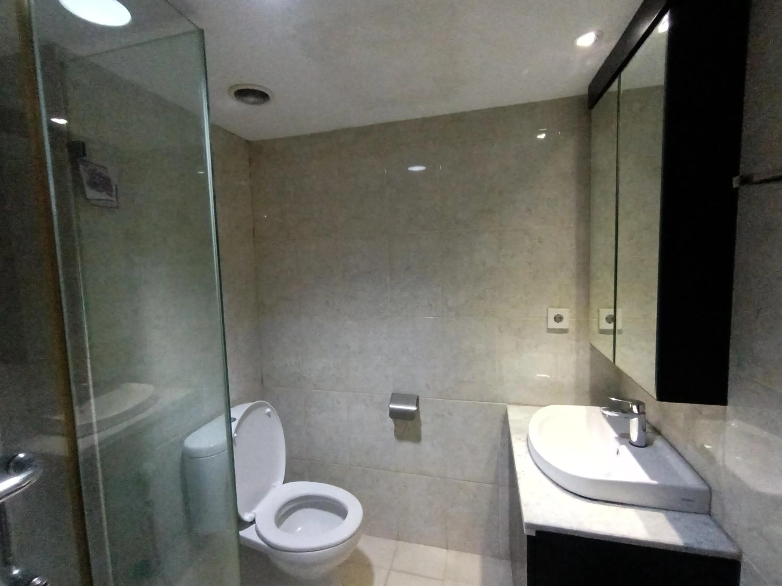 Bathroom in Cozy Tamansari Hive Cawang by Bonzela Property