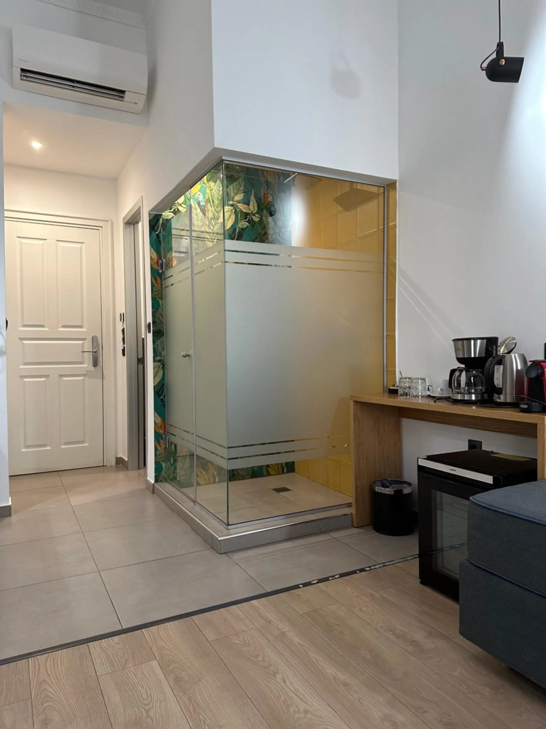 Shower in The Maroon Bottle Luxury Suites